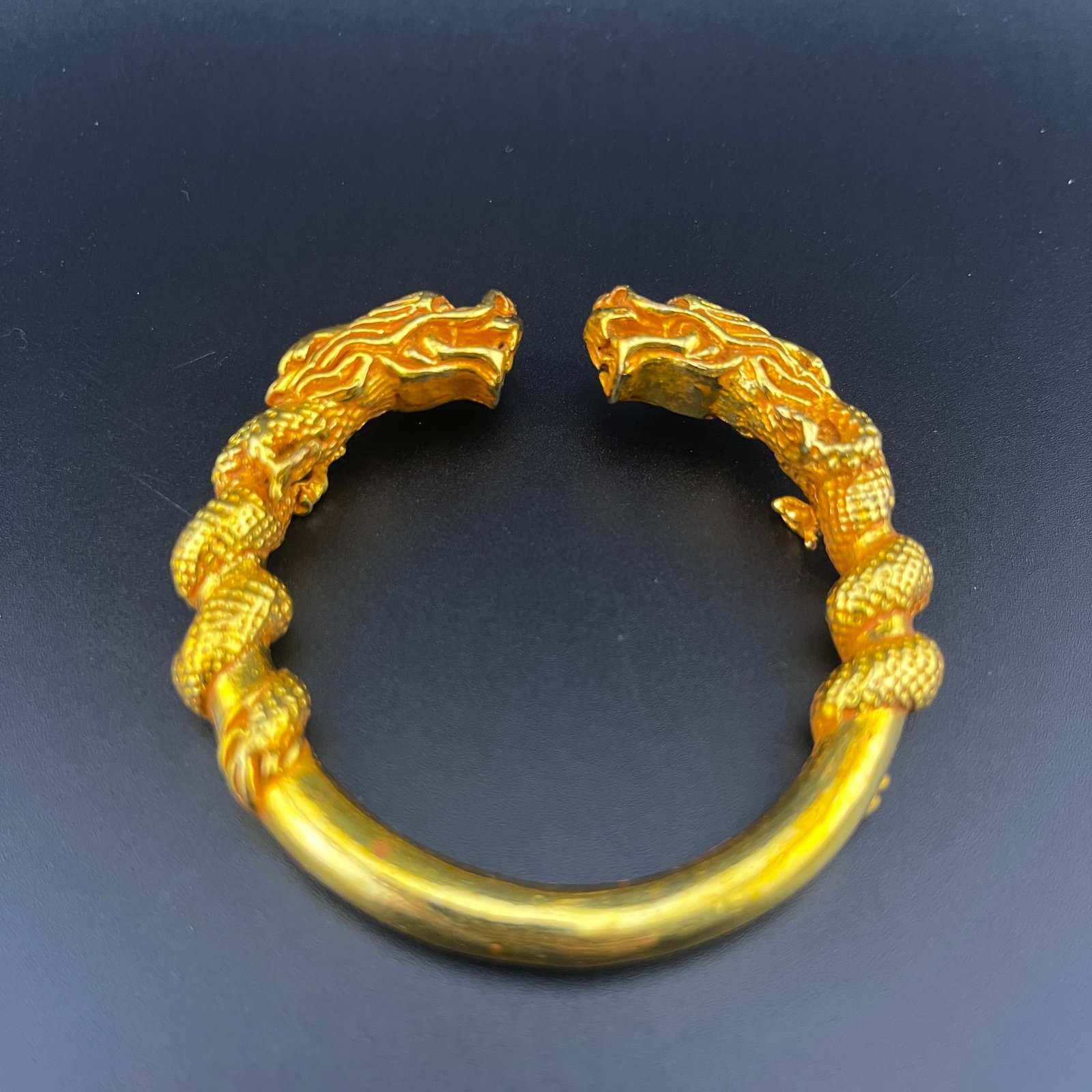 A FINE GILT BRONZE DRAGON BANGLE - 2