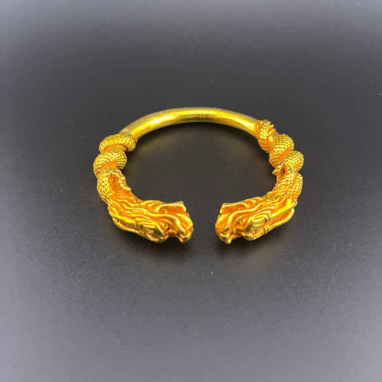 A FINE GILT BRONZE DRAGON BANGLE - 3