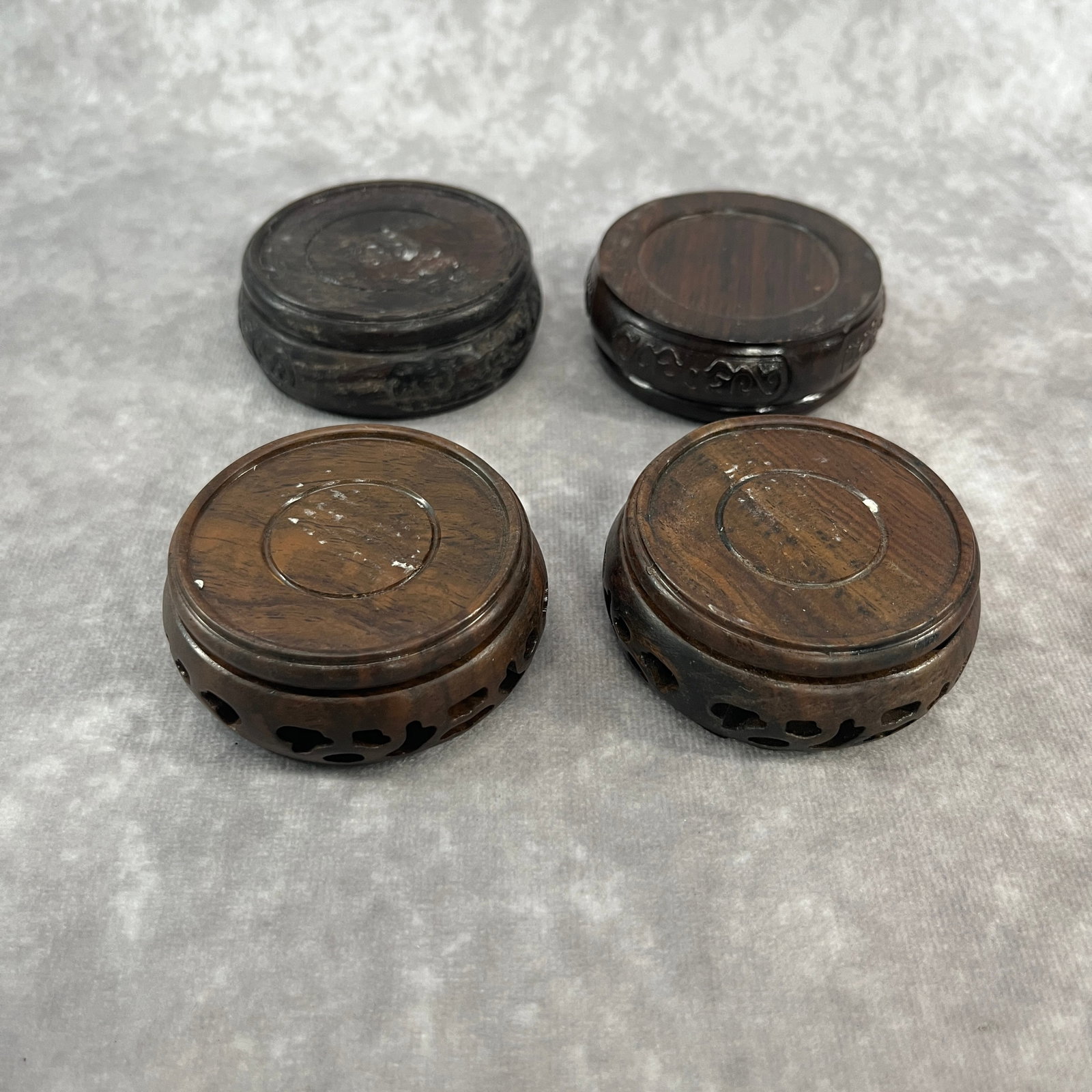 GROUP OF HARDWOOD MADE DISPLAY STAND: High: 0.95 inch; Diameter: 2.6 inch; High: 1 inch; Diameter: 3.7 inch;