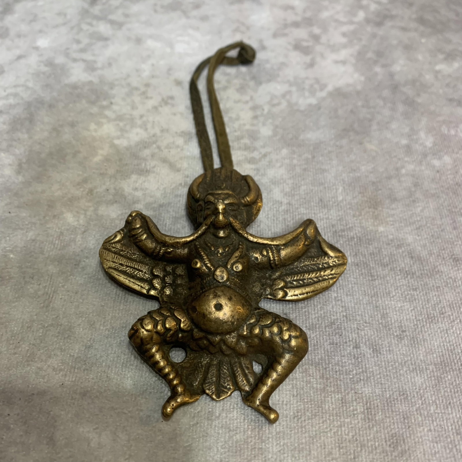 A FINE BRONZE GARUDA PENDANT: High: 3.8 inch; Width: 3.4 inch