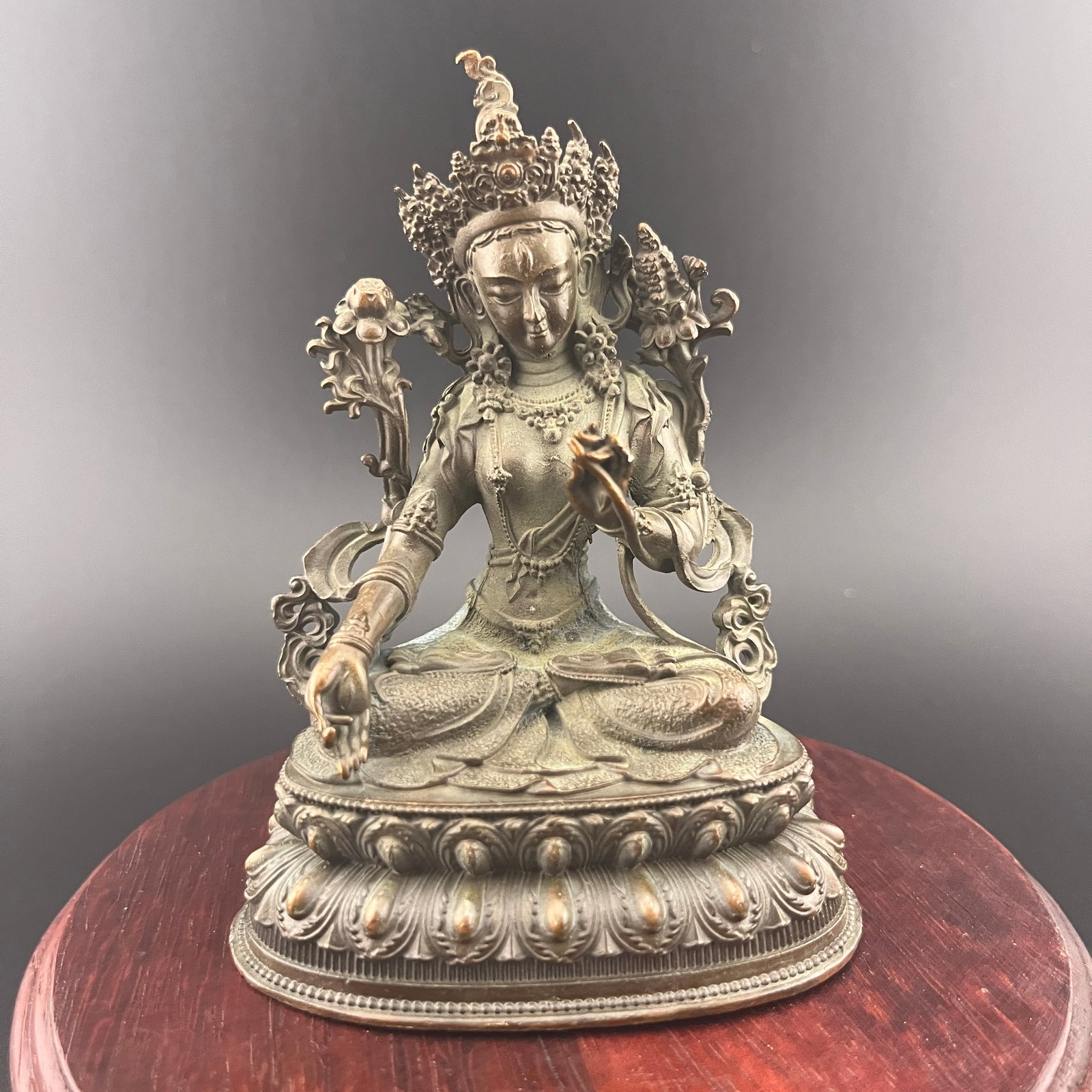 A FINE SMALL BRONZE GREEN TARA STATUE: Qing Dynasty; Long: 3 inch; Width:2.2 inch; Heigh: 4.1 inch; Woodbase for picture and display only