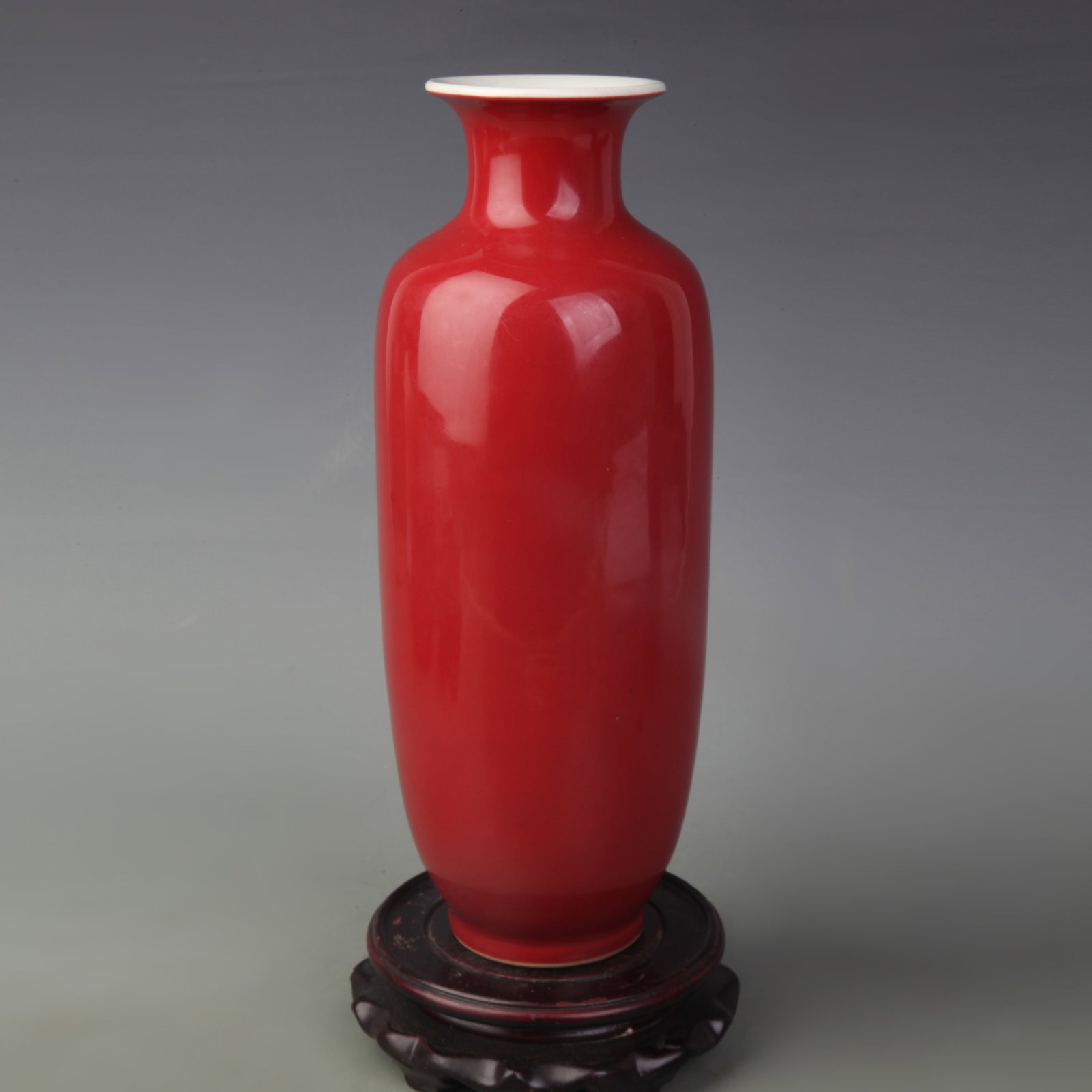 A RED-GLAZED YUHUCHUN VASE: Qing Dynasty Qian Long Period; High: 11.0 inch; Woodbase for picture and display only