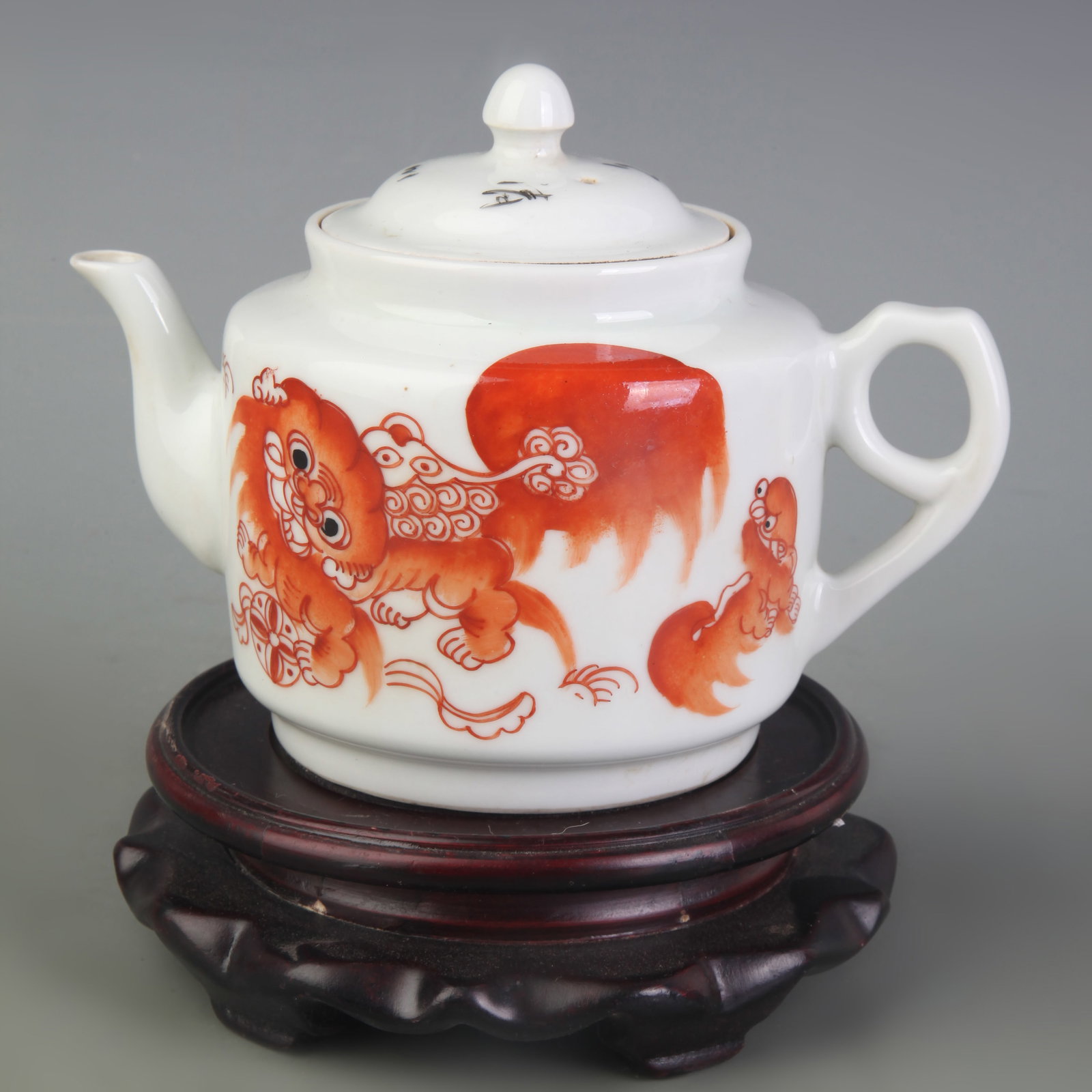 A FAMILLE ROSE TEAPOT WITH TAISHI SHAOBAO MOTIF: Qing Dynasty Tong Zhi Period; Width: 6.4 inch; High: 4.3 inch; Woodbase for picture and display only