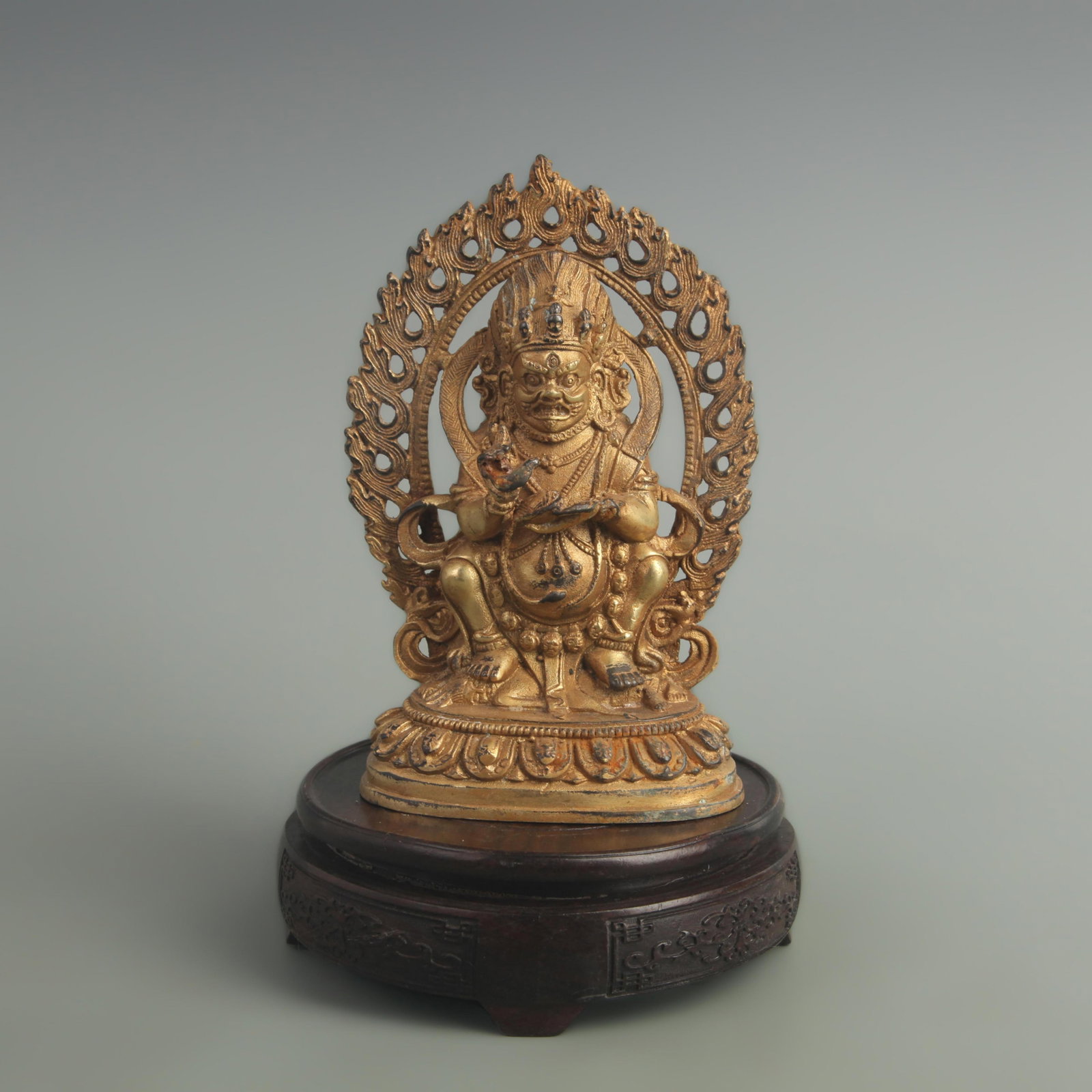 GILDED BRONZE STATUE OF THE TIBETAN GREAT BLACK HEAVEN: 20th Century; High: 6.50 inch; Width: 2.50 inch; Long: 4.00 inch; Woodbase for picture and display only
