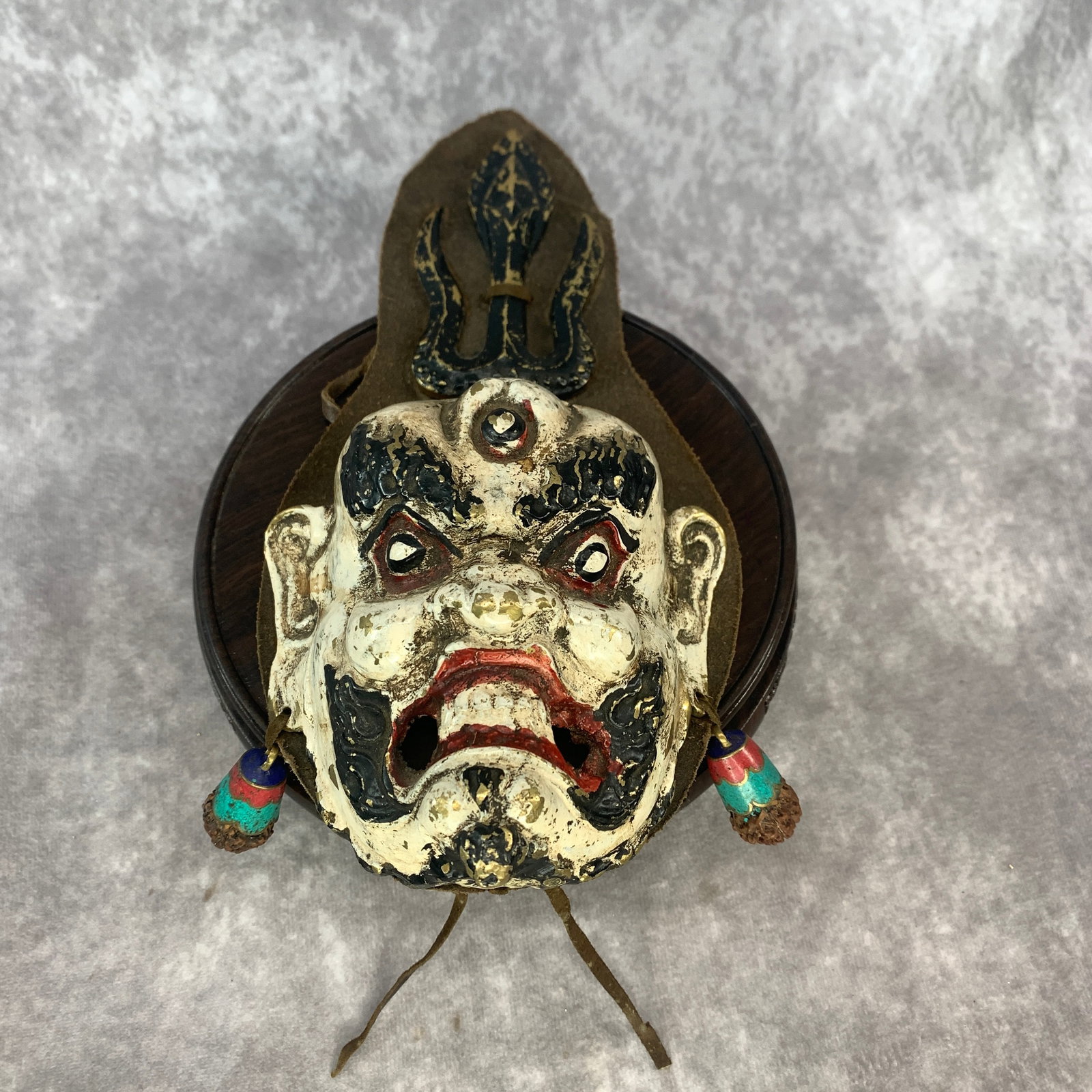 A FINE BRONZE AND COLORED TIBETAN RITUAL MAHAKALA MASK (1 of 6)