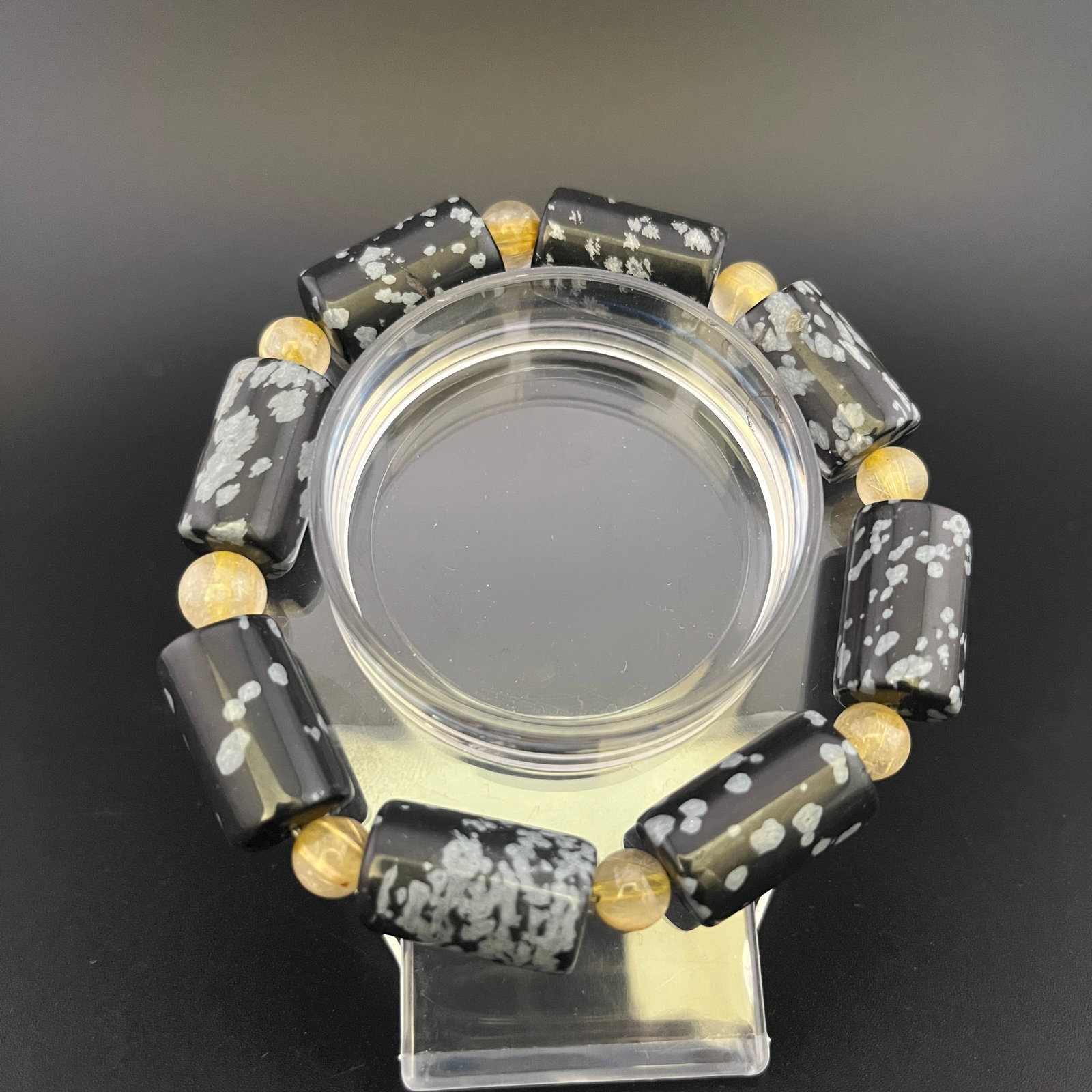 A FINE BLACK AGET MADE BRACELET: Modern; Long: 4.2 inch; Diameter: 0.45 inch; Woodbase for picture and display only