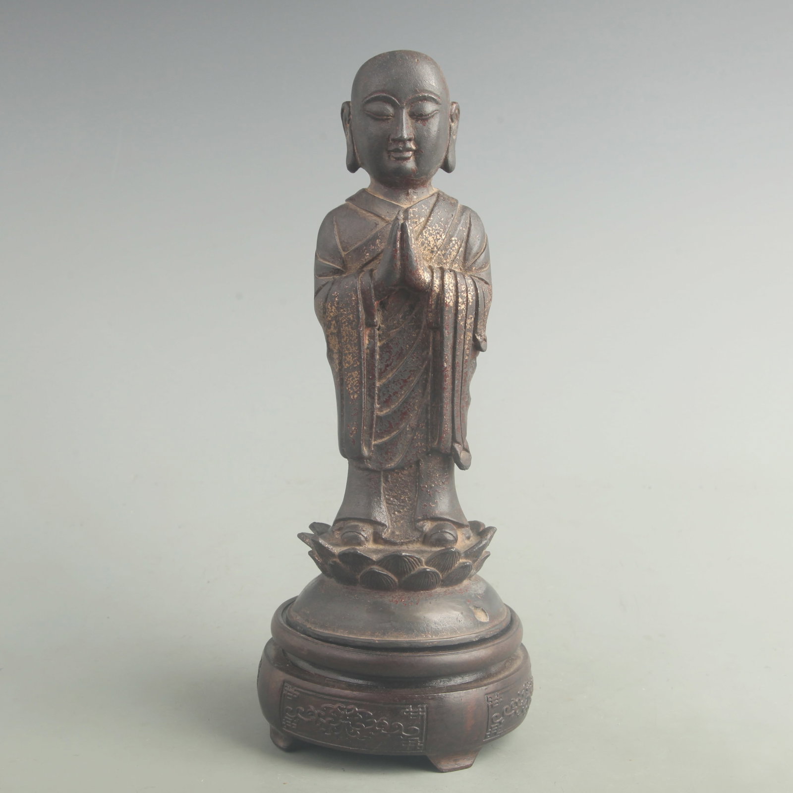 A GILT BRONZE ANANDA FIGURE: Qing Dynasty; High: 9.00 inch; Width: 3.80 inch; Woodbase for picture and display only