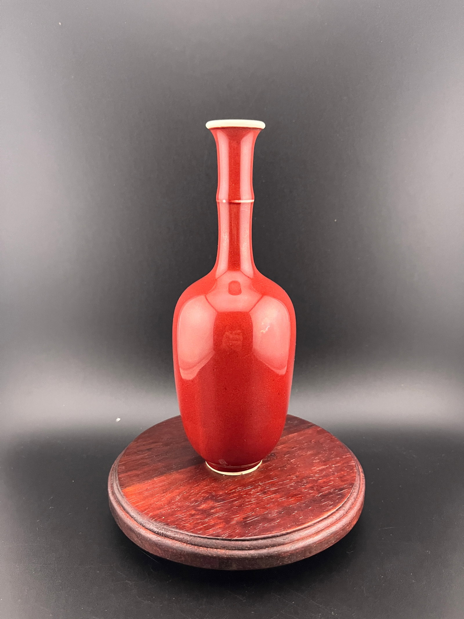A FINE LANGYAO SANG-DE-BOEUF GLAZ PORCELAIN VASE: Ming Dynasty Style; Heigh: 6.7 inch; Diameter: 2.4 inch; Woodbase for picture and display only