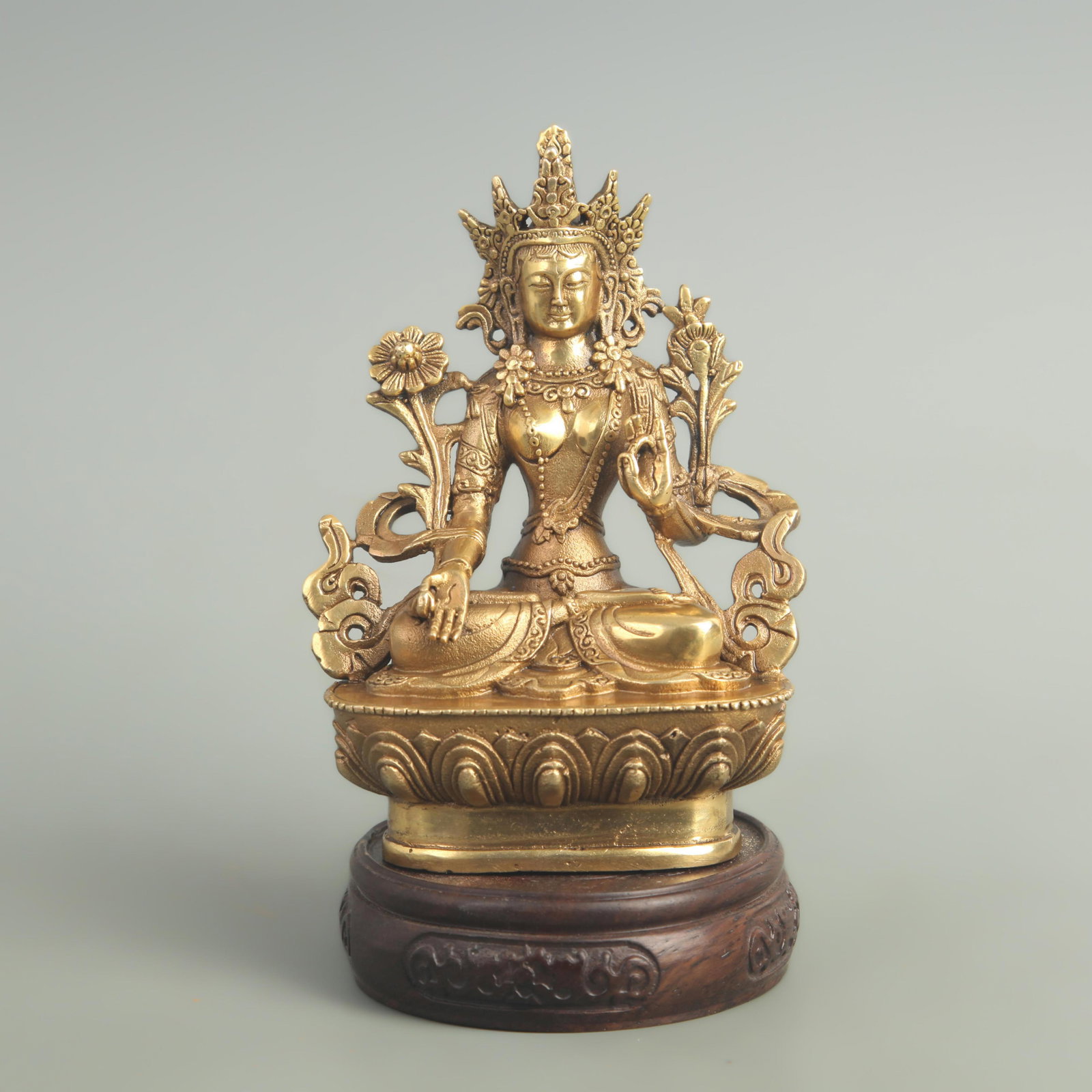 A FINE GILT BRONZE GREEN TARA STATUE: 19th Century; High: 6.00 inch; Width: 1.80 inch; Long: 2.80 inch; Woodbase for picture and display only