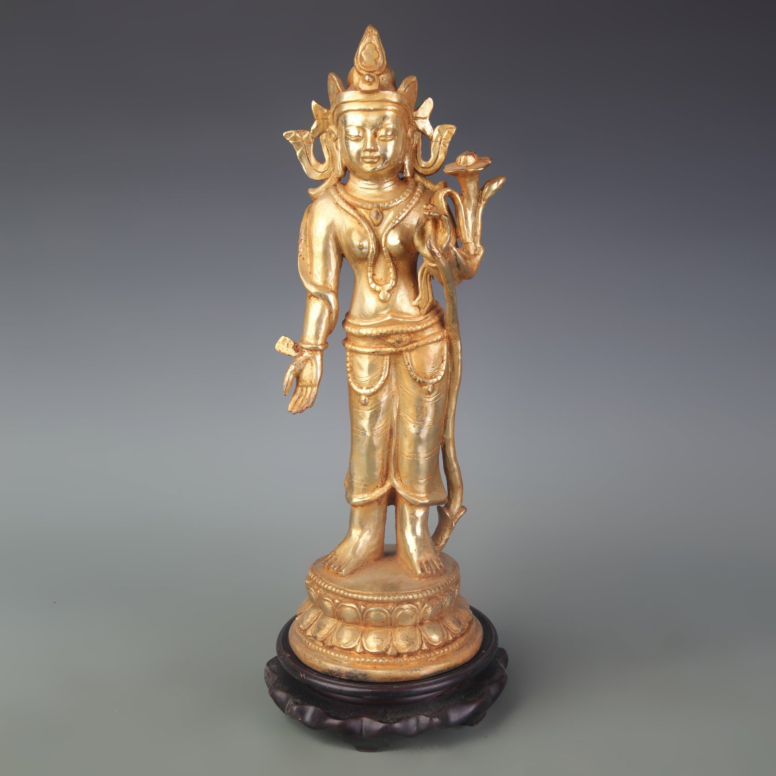 A GILT BRONZE BUDDHA FIGURE: Qing Dynasty; Width: 5.0 inch; High: 13.6 inch; Woodbase for picture and display only