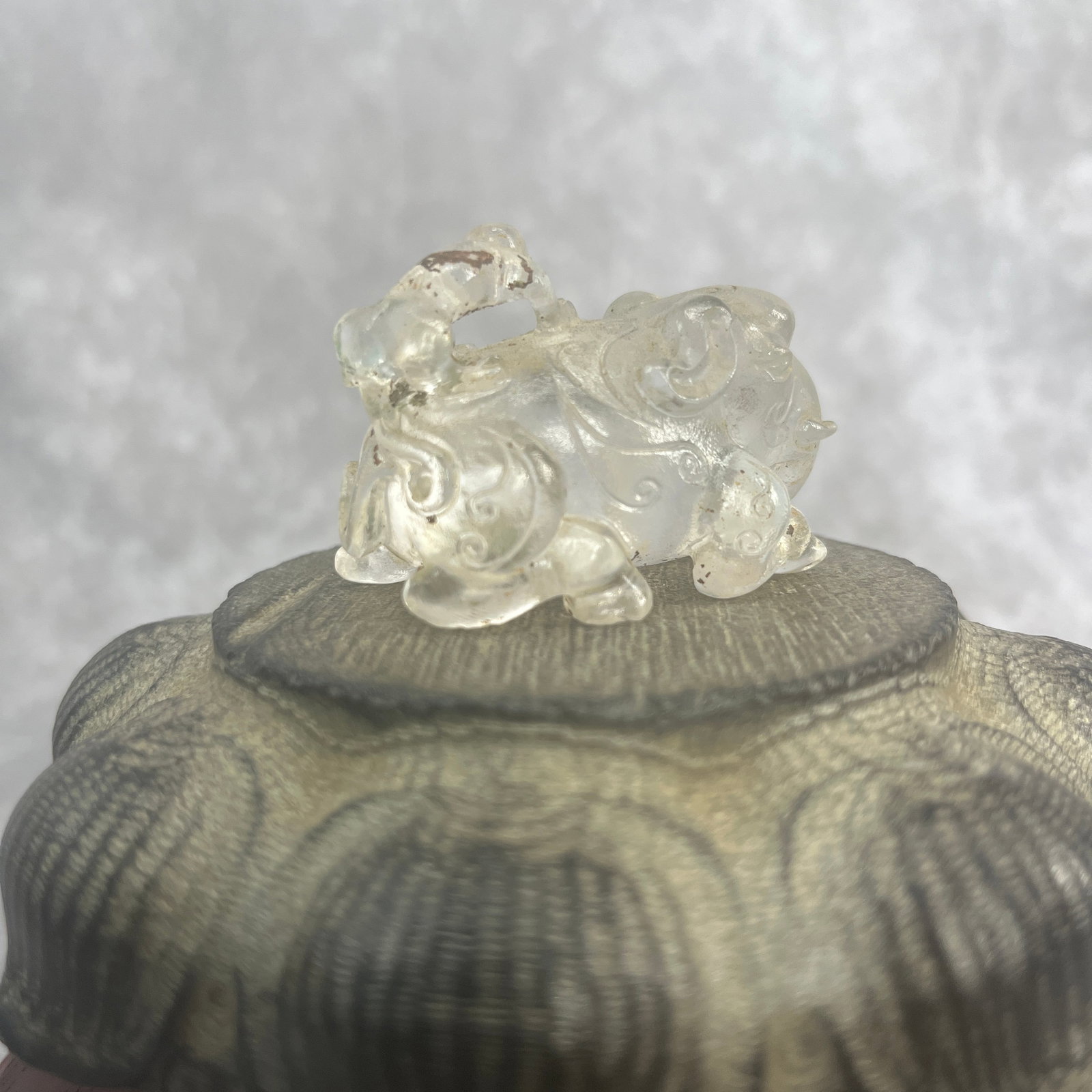 A FINE CRYSTAL MADE BOY PLAYING FIGURE - 3