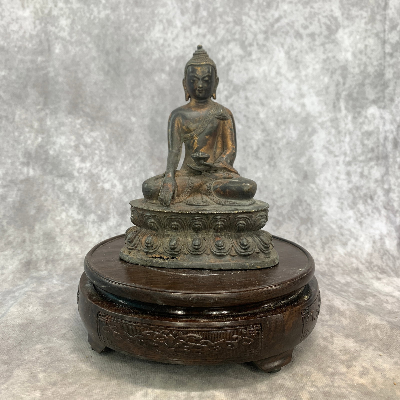 BRONZE SEATED STATUE OF SHAKYAMUNI BUDDHA: Qing Dynasty; Long: 4.3 inch; Width:2.8 inch; Heigh: 5.7 inch; Woodbase for picture and display only