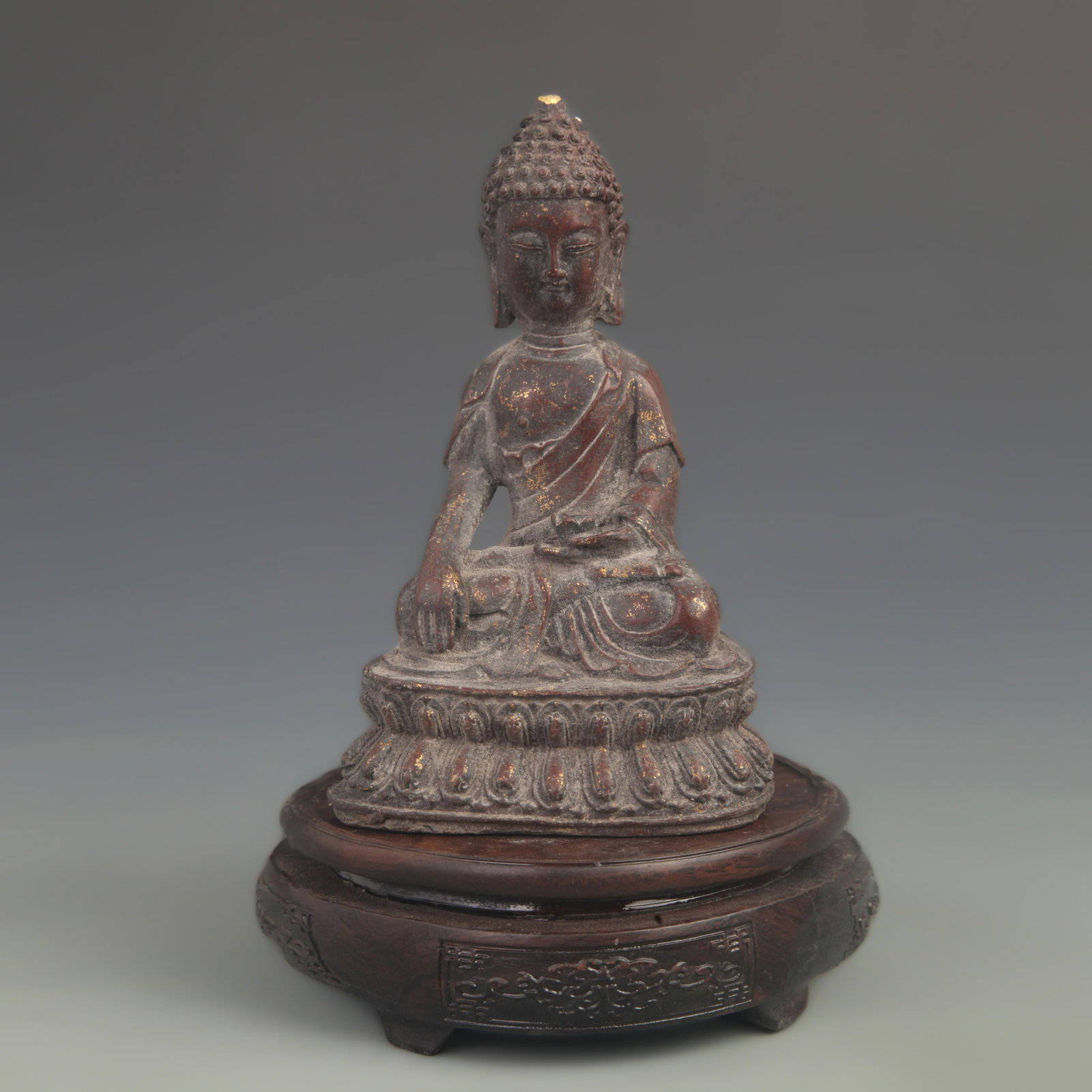 BRONZE SEATED STATUE OF SHAKYAMUNI BUDDHA: Ming Dynasty Style; High: 7.50 inch; Diameter: 4.00 inch; Woodbase for picture and display only