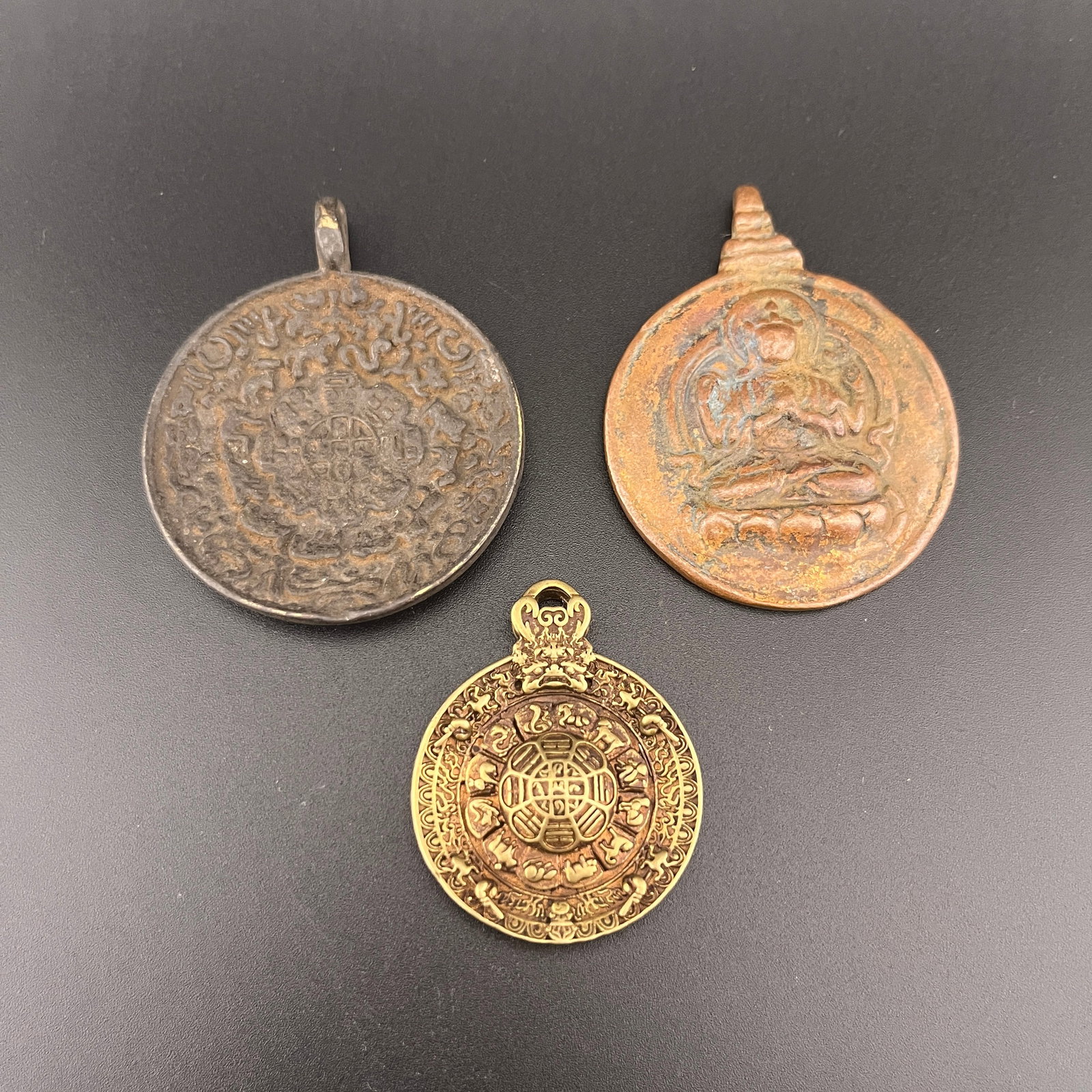 GROUP OF TIBETAN SIPAHO AMULET, NINE-PALACE BAGUA TALISMAN: Modern; Long: 2.2 inch; Width:1.8 inch; Heigh: 0.3 inch; Long: 2.26 inch; Width:1.75 inch; Heigh: 0.25 inch; Long: 1.65 inch; Width:1.29 inch; Heigh: 0.29 inch; Woodbase for picture and display only