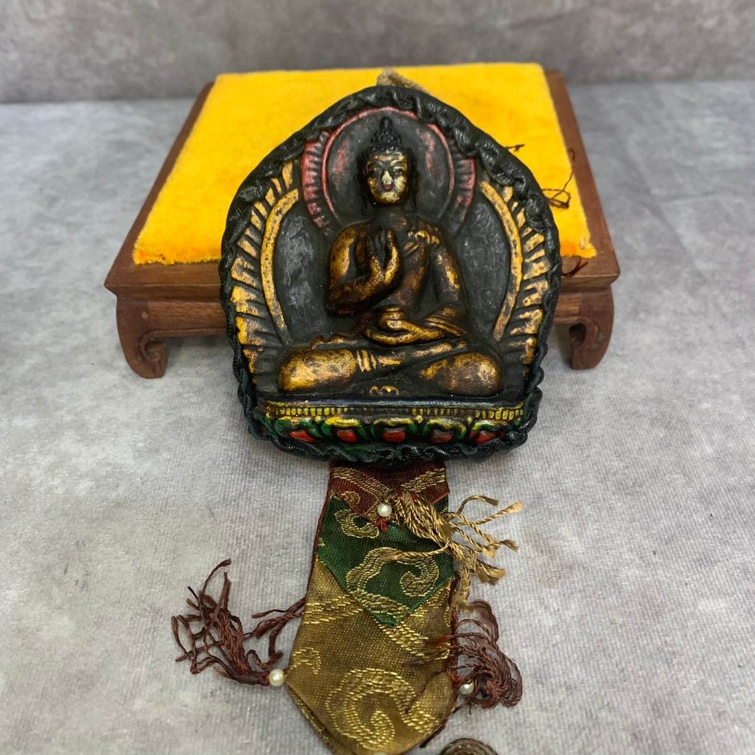 A FINE WOOD CARVING TIBETAN PENDANT: Qing Dynasty; High: 4.3 inch; Width: 3.8 inch; Woodbase for picture and display only