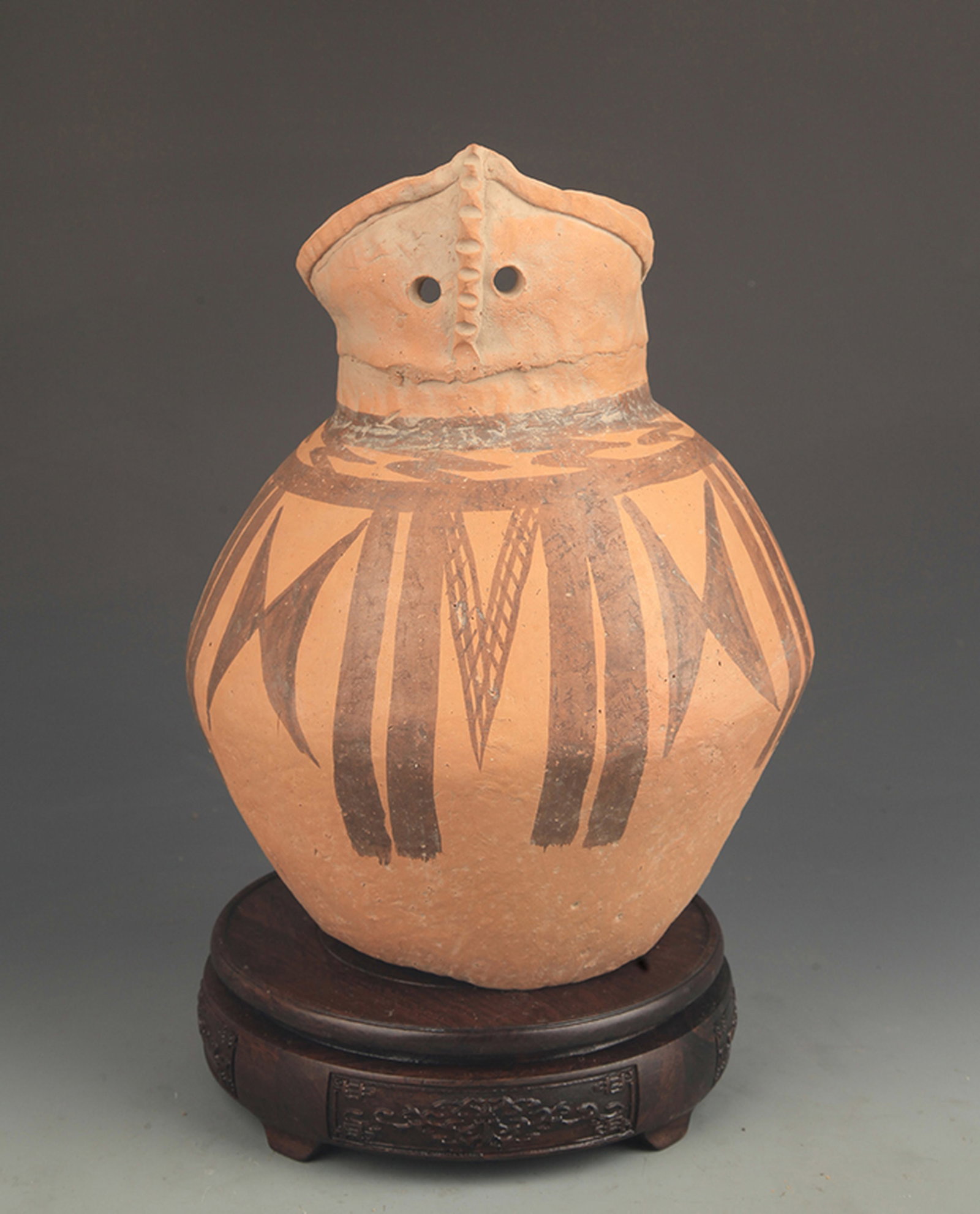 A MAJIAYAO CULTURE PAINTED POTTERY OWL-FORM EWER: New Stone Age Style; High: 10.00 inch; Diameter: 4.25 inch; Woodbase for picture and display only