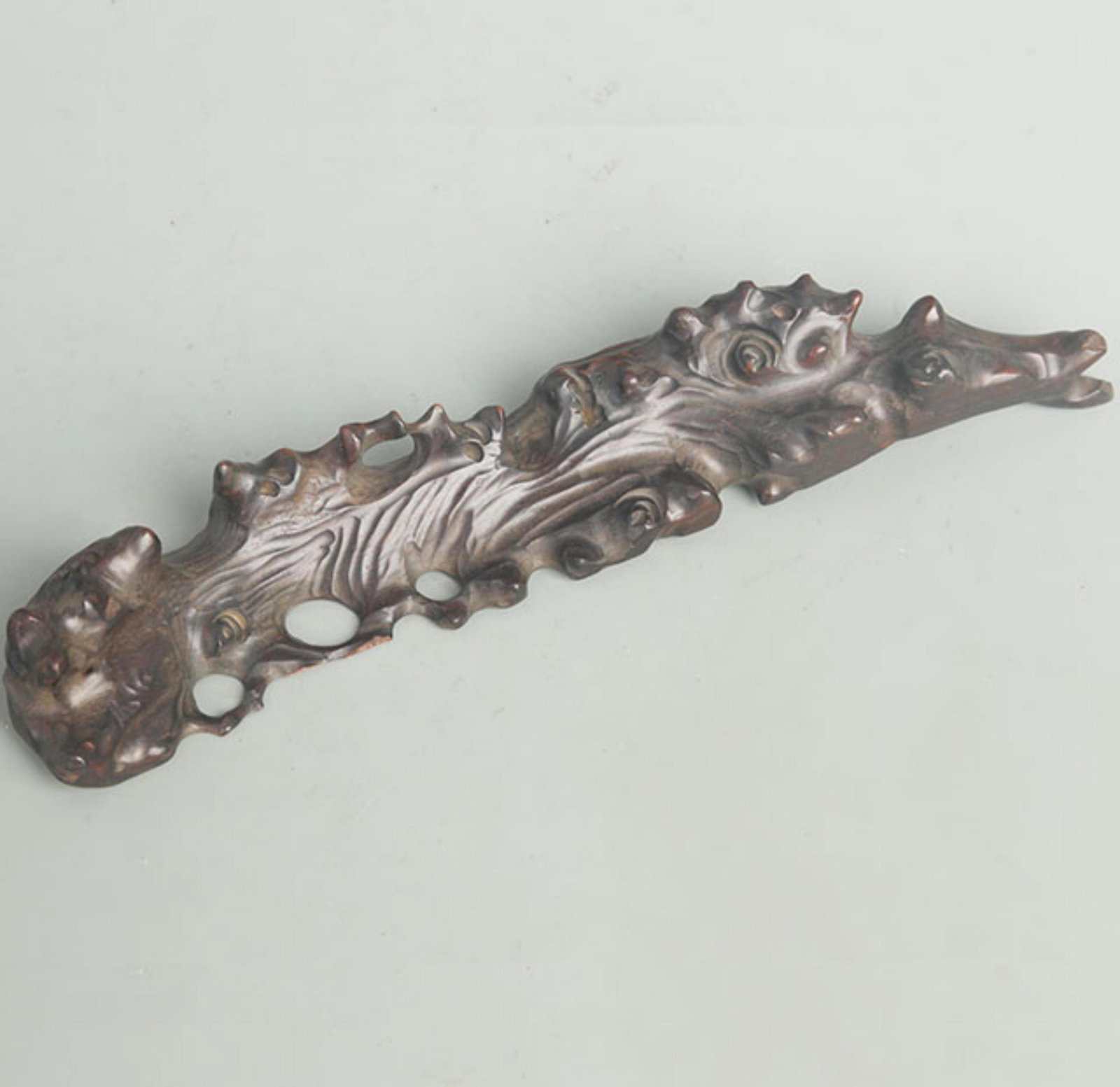 A FINE ROSEWOOD PEN HOLDER: 20th Century, High: 1.50 inch; Width: 1.25 inch; Long: 12.5 inch; Woodbase for picture and display only