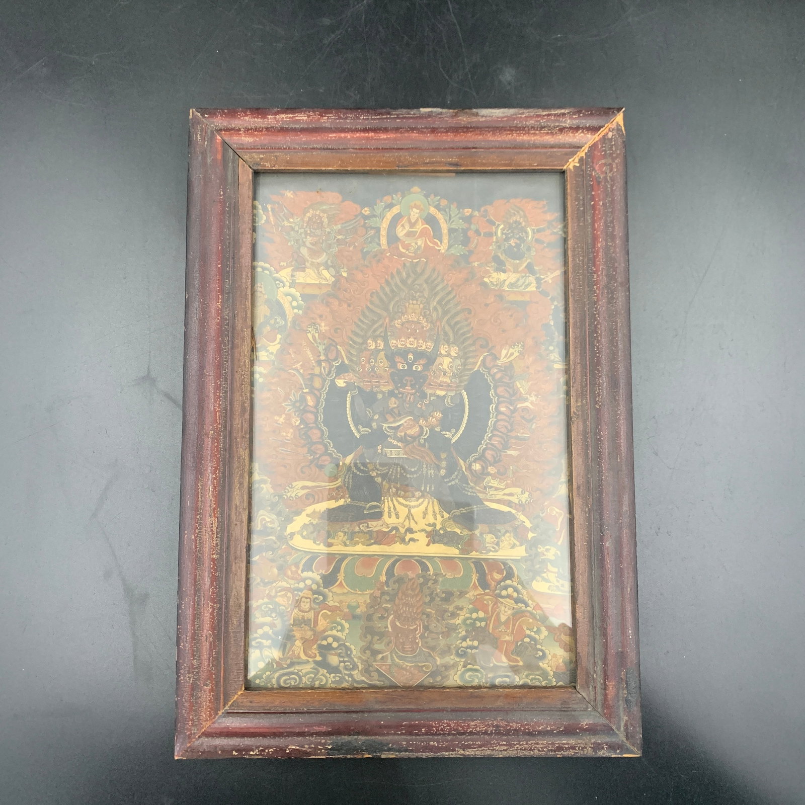A SMALL TIBETIAN THANGKA IN VINTAGE WOOD FRAME: 19th Century; Long: 11.8 inch; Width:8.2 inch; Heigh: 0.8 inch; Woodbase for picture and display only