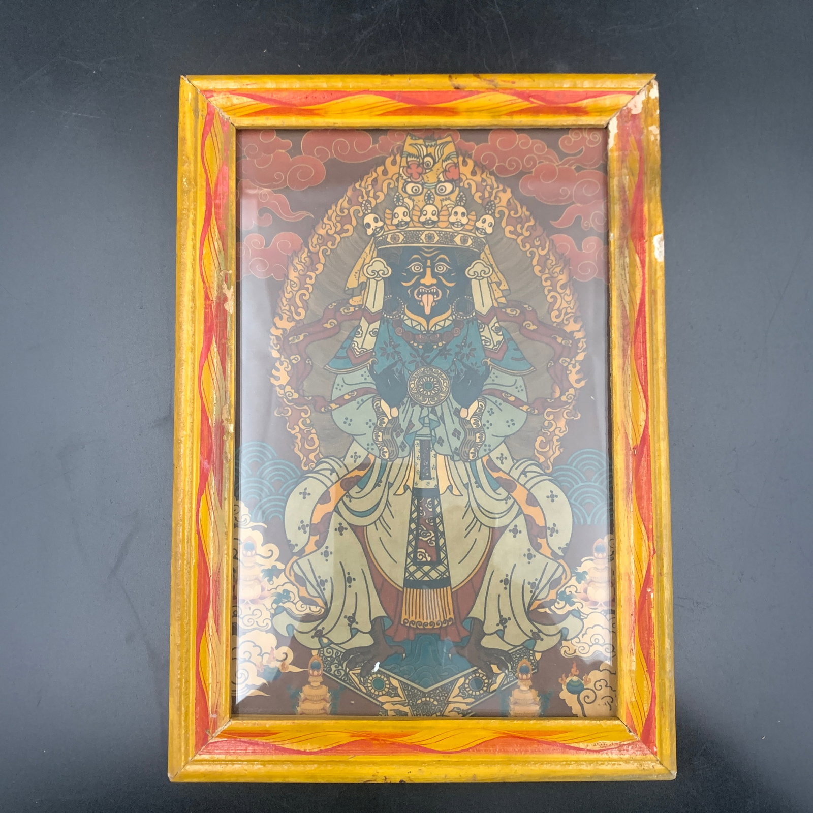A SMALL TIBETIAN THANGKA IN VINTAGE WOOD FRAME: 19th Century; Long: 11.7 inch; Width:8.2 inch; Heigh: 0.5 inch; Woodbase for picture and display only