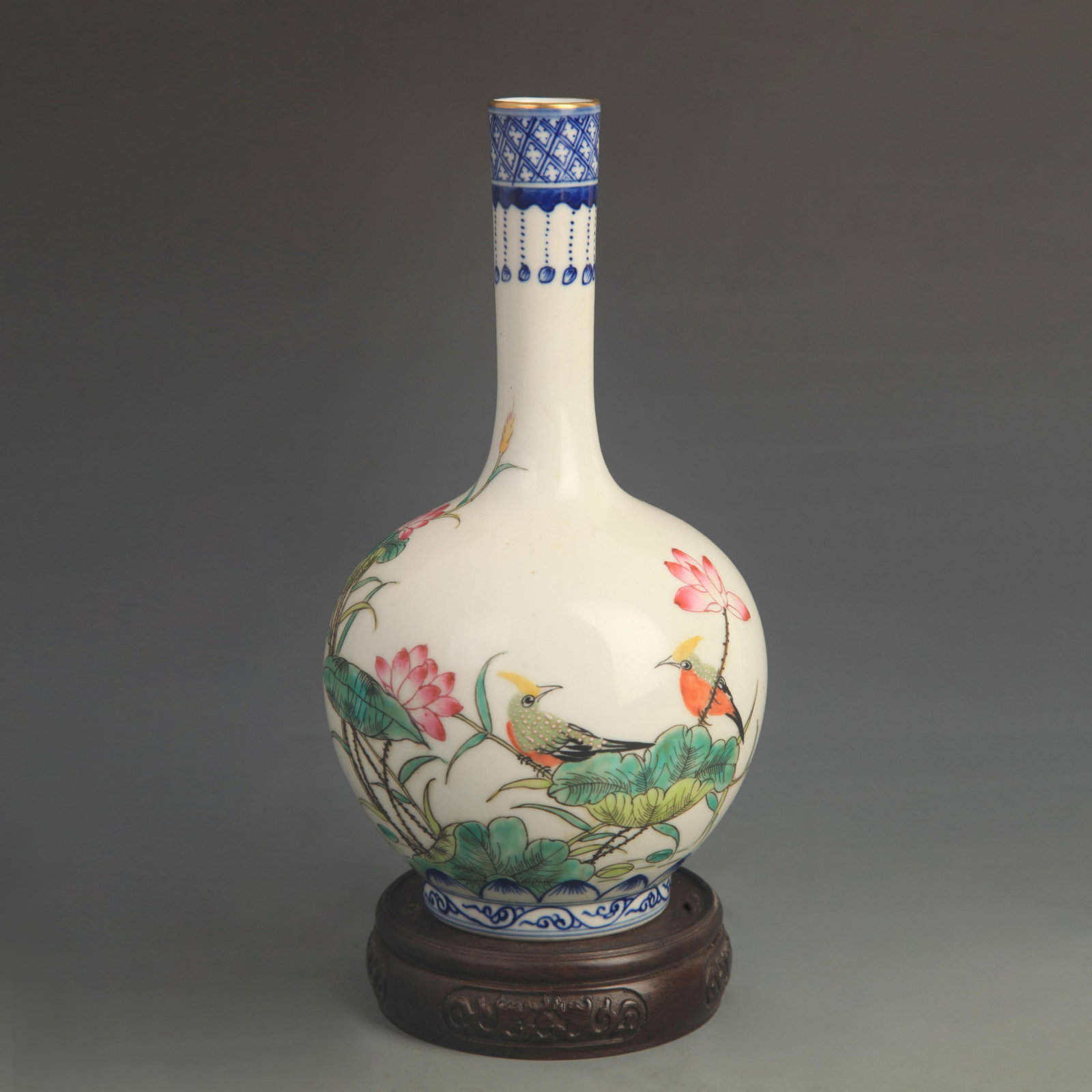 FINE ENAMEL COLOR FLOWER AND BIRD PATTERN LONGNECK VASE: Qing Dynasty Qian Long Period; High: 8.80 inch Diameter: 4.50 inch ; Woodbase for picture and display only