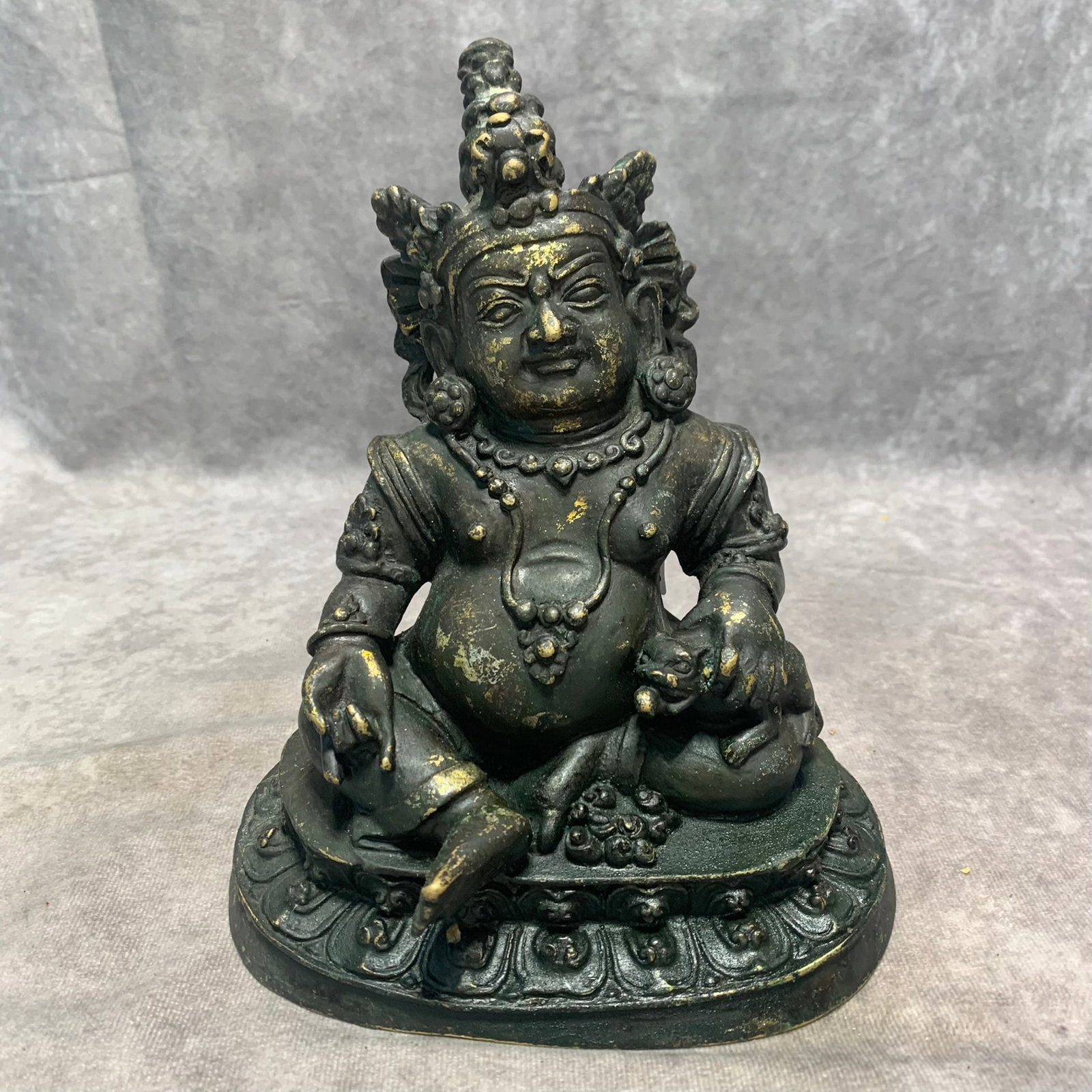 TIBETAN BUDDHIST GILDED BRONZE VAISRAVANA STATUE: Qing Dynasty; Long: 6.6 inch; Width: 4.8 inch; High: 7.4 inch; Woodbase for picture and display only