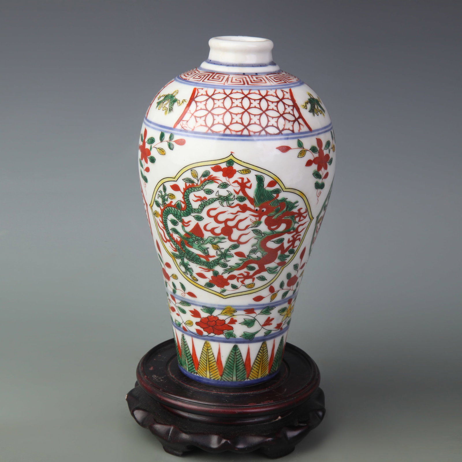 WUCAI (FIVE-COLORED) MEIPING STYLE PORCELAIN VASE WITH DRAGON MOTIF: Ming Dynasty Jia Qing Period; High: 8.1 inch; Woodbase for picture and display only