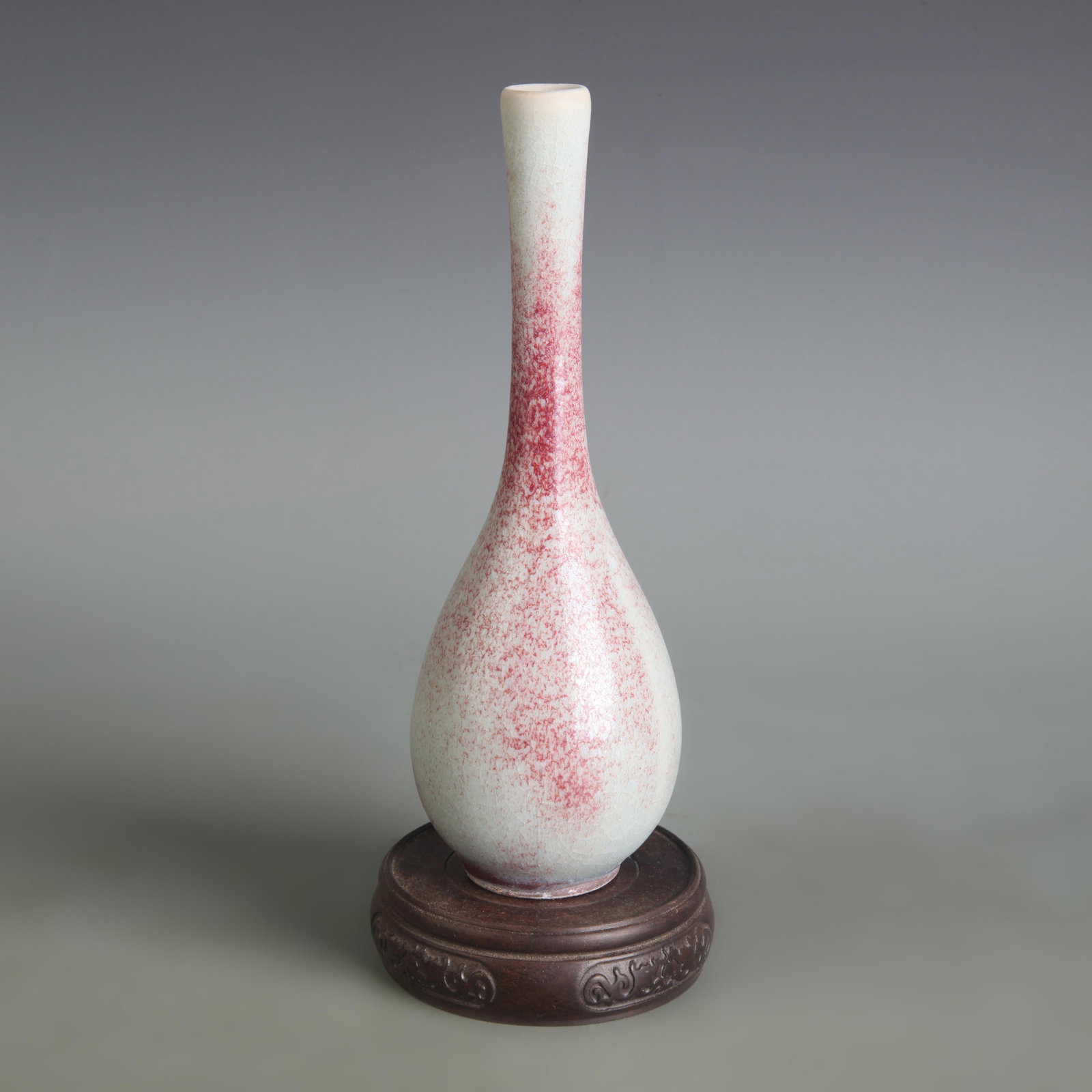 A FINE JUN KILN SMALL PORCELAIN BOTTLE: Song Dynasty Style; Diameter: 1.8 inch; High: 8.6 inch; Woodbase for picture and display only