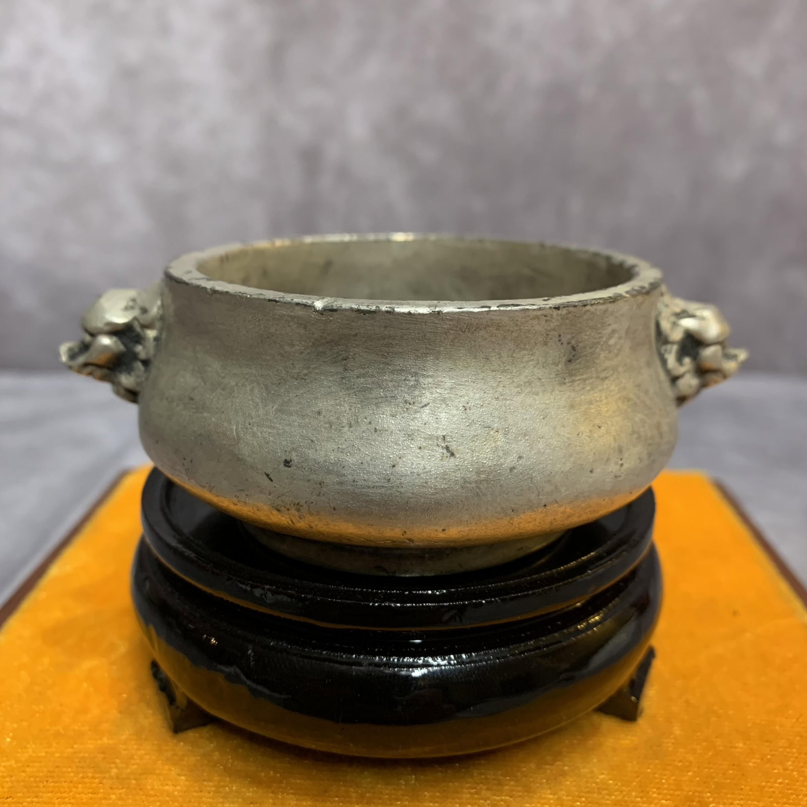 A FINE DOUBLE EAR ROUND WHITE BRONZE CENSER: 19th Century; High: 1.4 inch; Diameter: 2.9 inch ; Woodbase for picture and display only