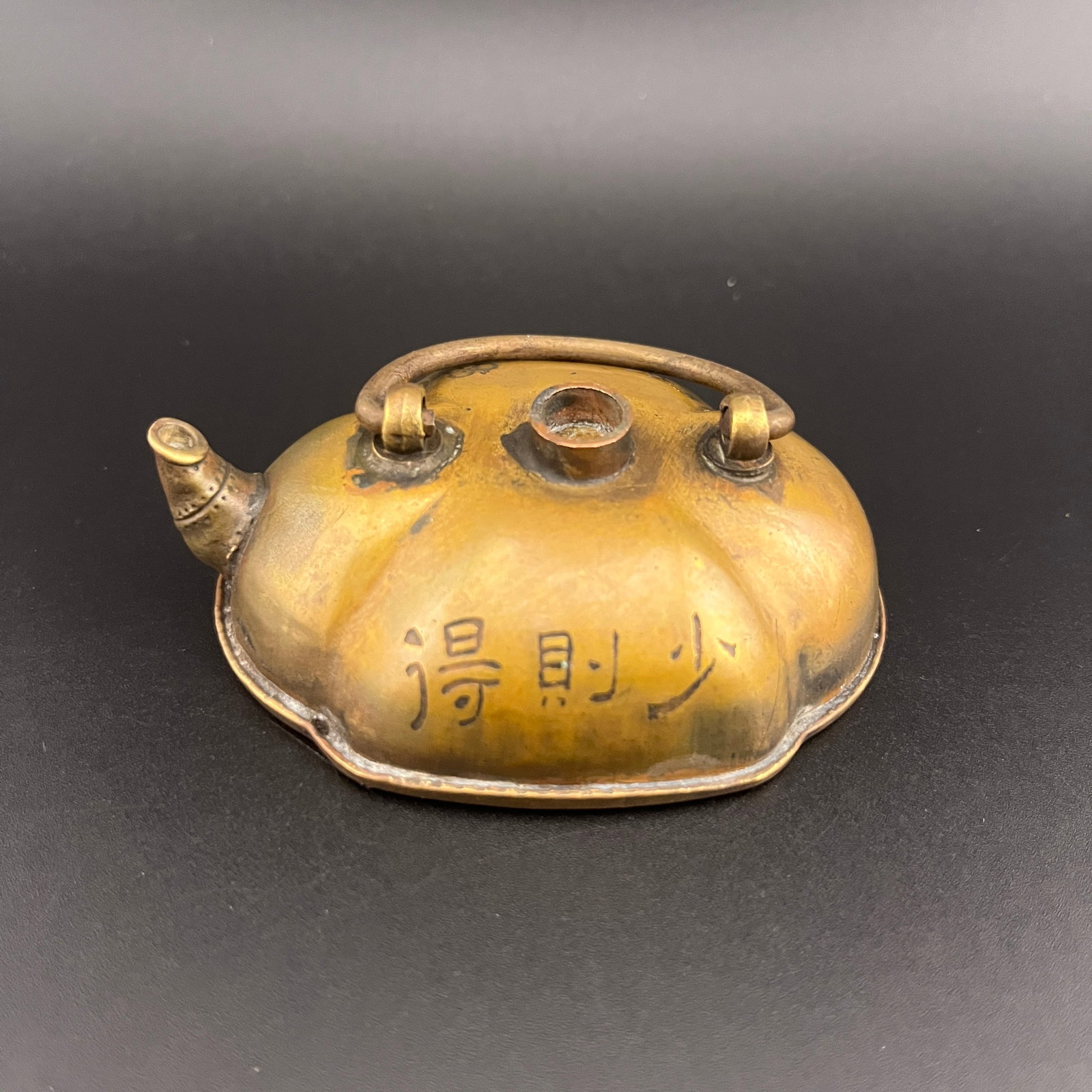 A FINELY CARVED BRONZE GROUND SHAPED WATER DROPPER (1 of 5)