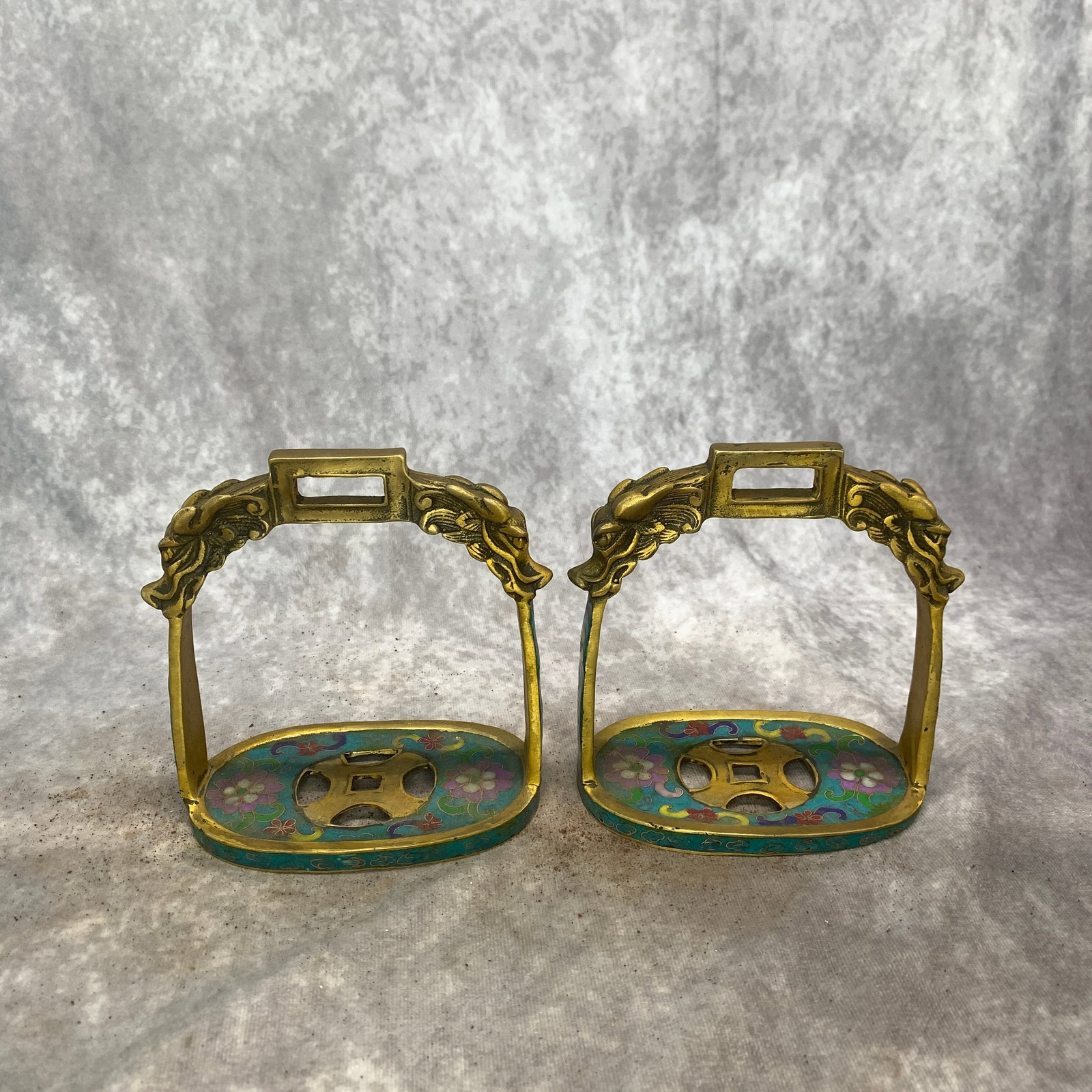 PAIR OF CHINESE CLOISONNE BRONZE STIRRUPS: Qing Dynasty; Long: 5.1 inch; Width:2.4 inch; Heigh: 5.6 inch; Woodbase for picture and display only