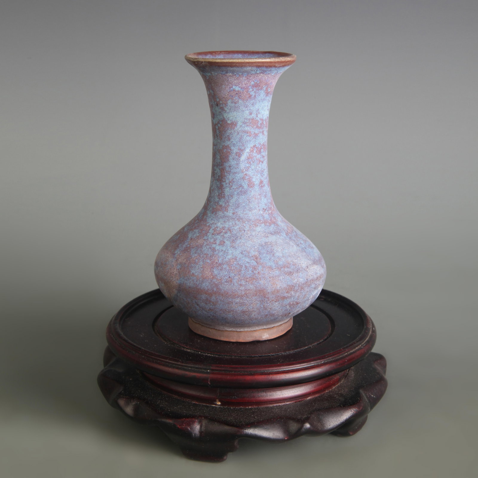 A FINE JUN WARE SMALL LONG NECK BOTTLE: Song Dynasty Style; Diameter:1.9 inch; High: 4.7 inch; Woodbase for picture and display only