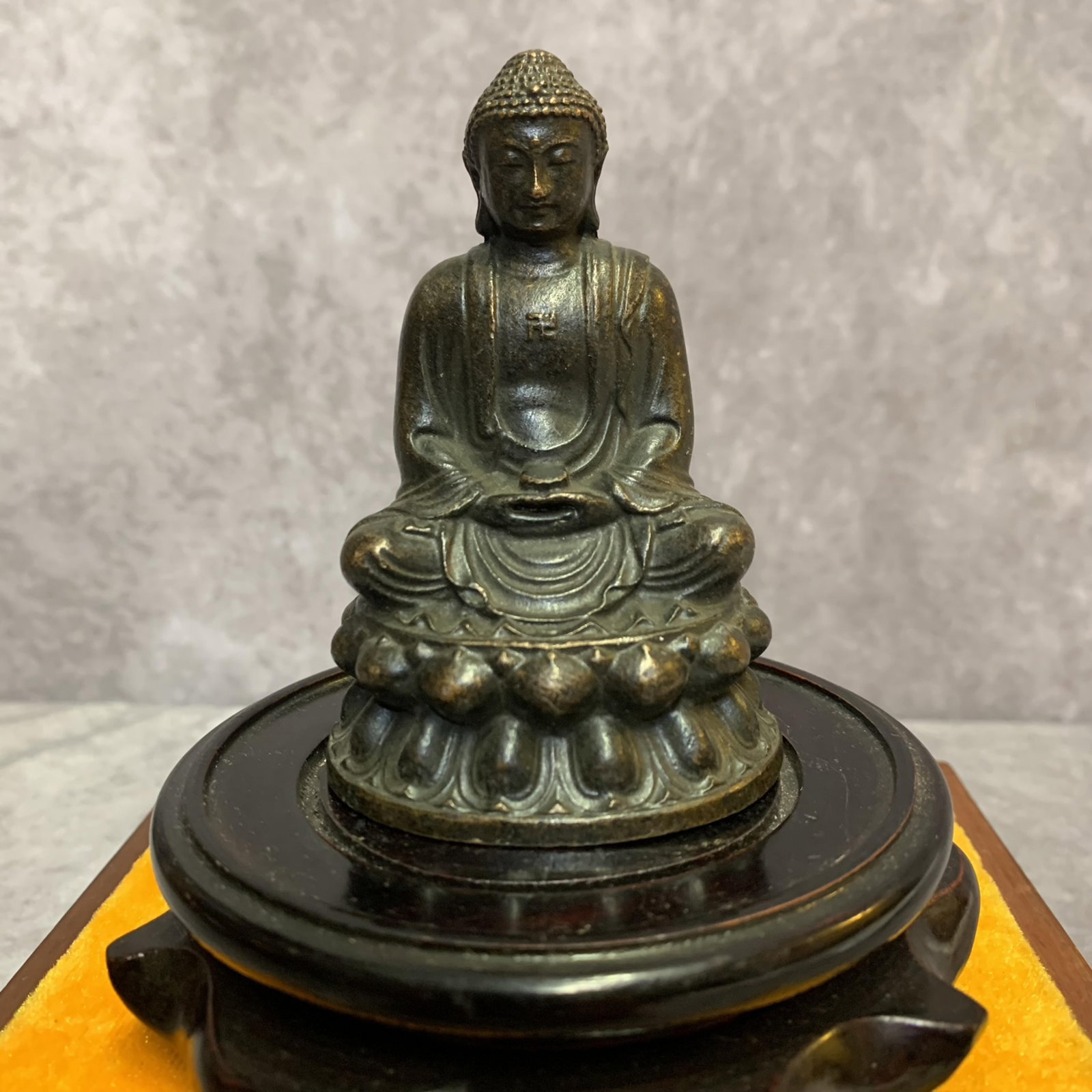 A SMALL BRONZE MAITREYA BUDDHA STATUE: 20th Century; High: 3.6 inch; Width: 2.4 inch; Diameter: 1.9 inch; Woodbase for picture and display only