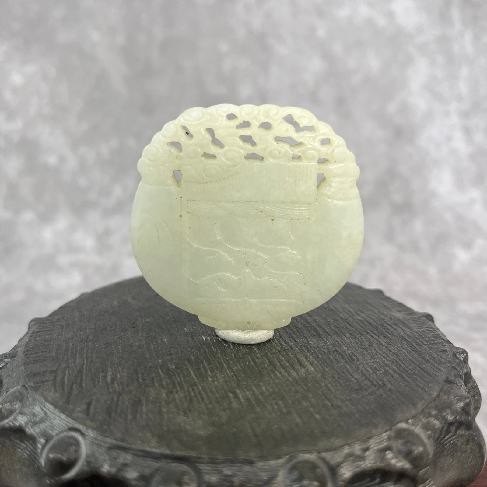 A FINE HAND CARVING WHITE JADE PENDANT: Qing Dynasty; High: 0.32 inch; Diameter: 2.02 inch; Woodbase for picture and display only