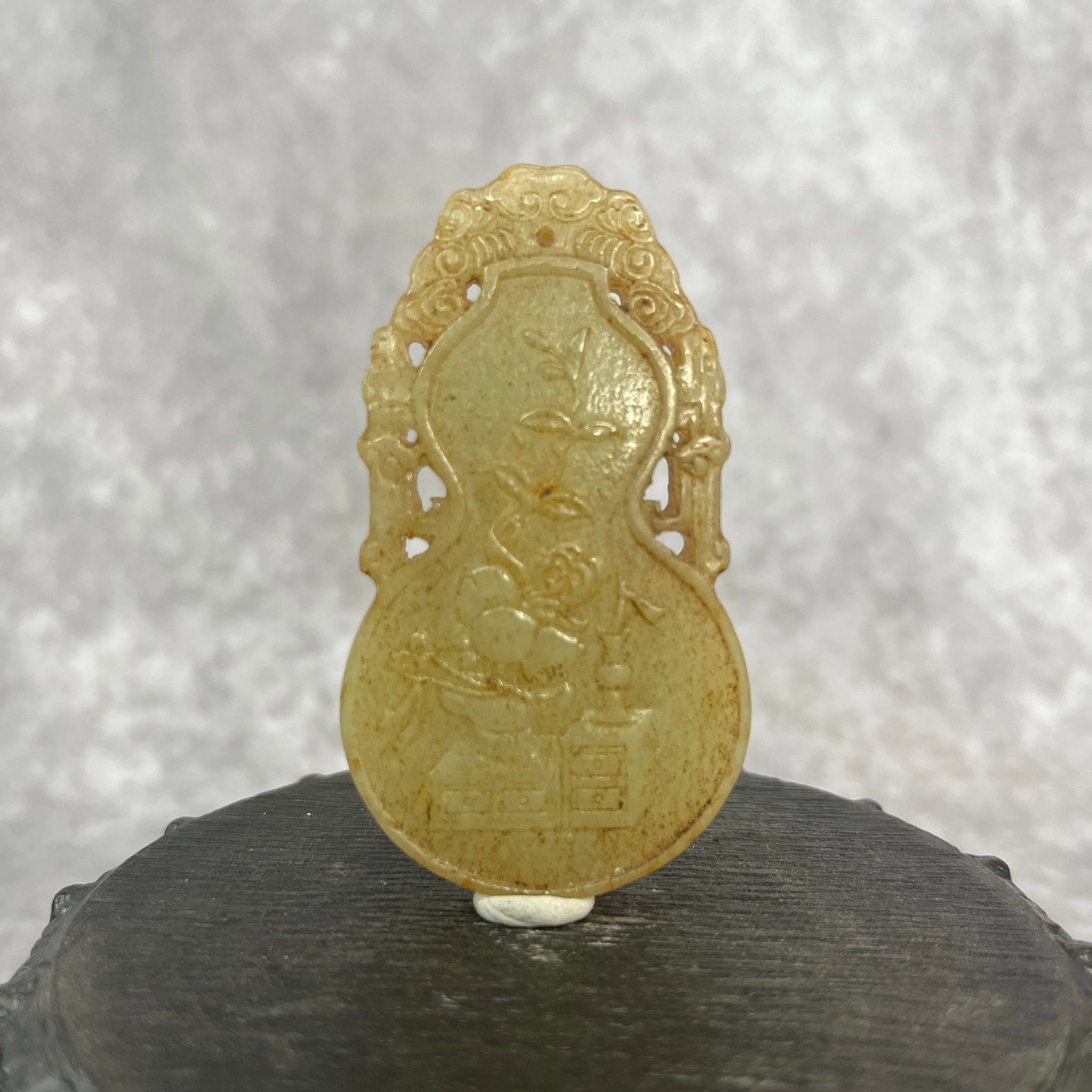 A FINE HETIAN PALE CELADON JADE IN FIGURE OF DOUBLE GROUND: Qing Dynasty; Long: 2.73 inch; Width: 1.54 inch; High: 0.28 inch; Woodbase for picture and display only