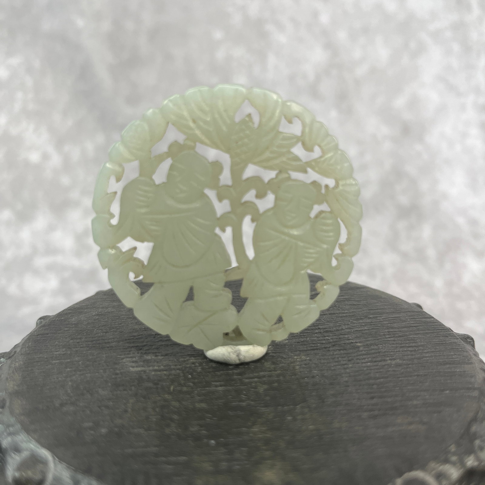 A FINE HETIAN JADE IN FIGURE OF HE-HE ER XIAN, TWO IMMORTALS: Qing Dynasty; Heigh: 0.16 inch; Diameter: 2.02 inch; Woodbase for picture and display only