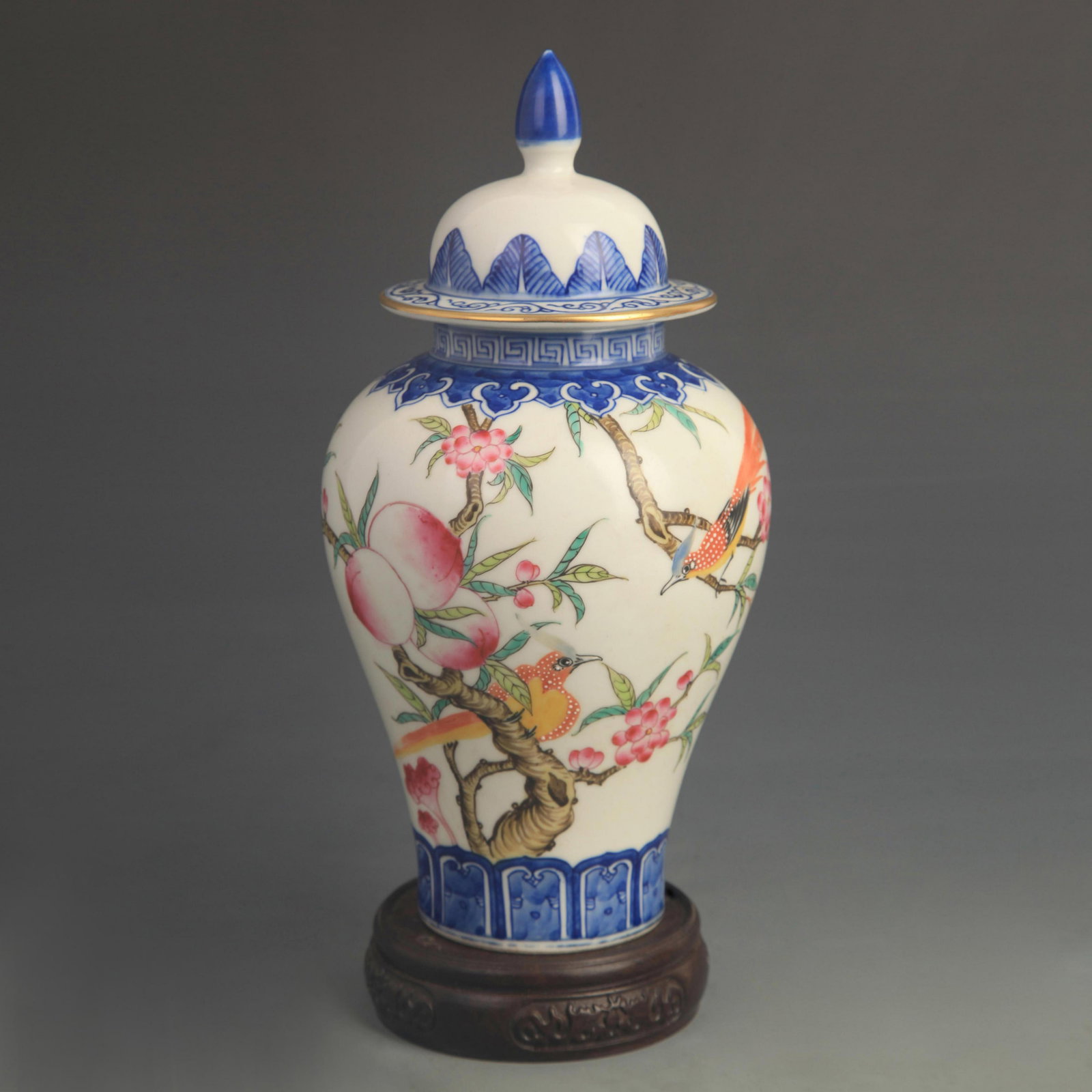 A FINE ENAMEL COLOR FLOWER AND BIRD PORCELAIN JAR: Qing Dynasty Qian Long Period, High: 9.80 inch; Diameter:4.60 inch; Woodbase for picture and display only