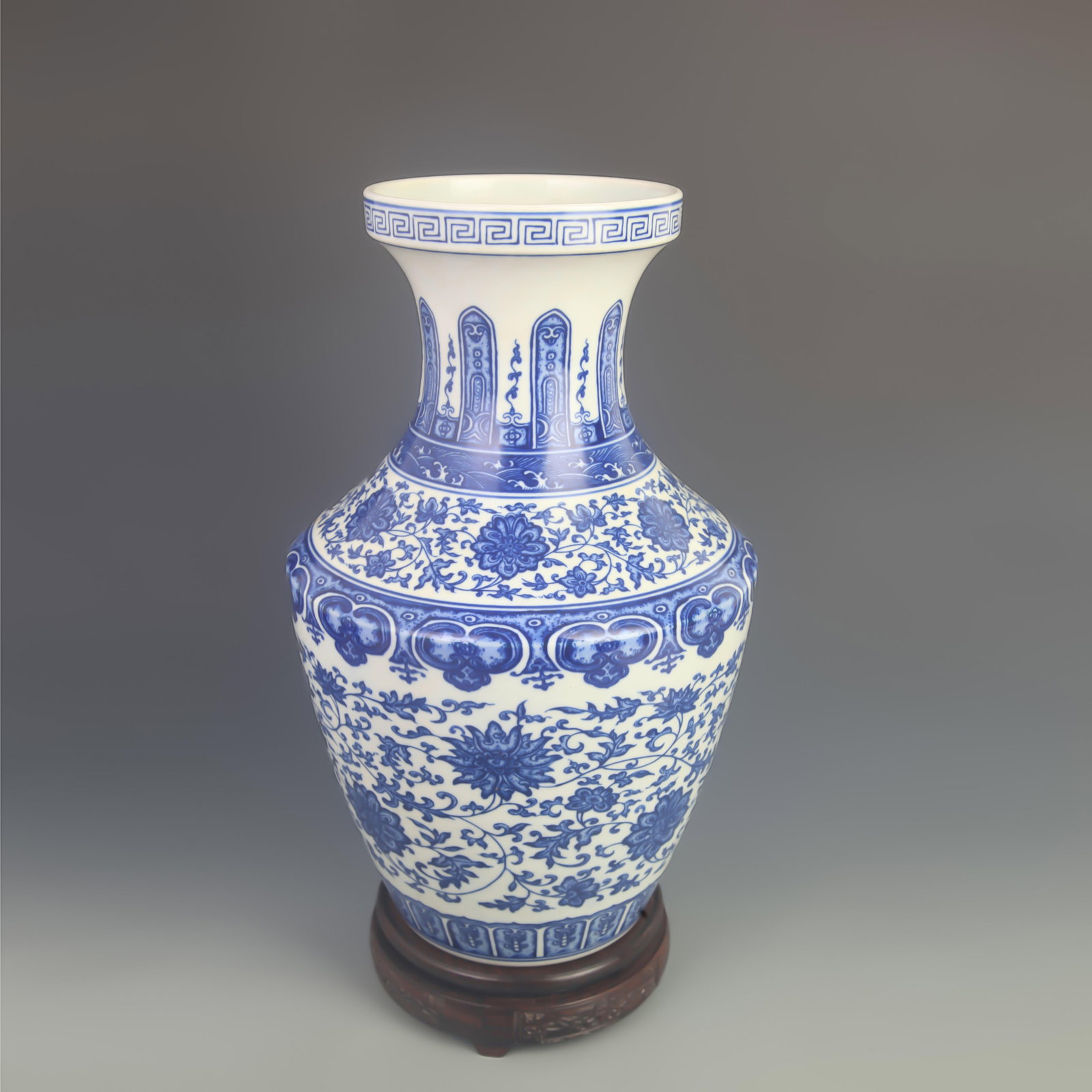 A BLUE AND WHITE LOTUS SCROLL DISPLAY VASE (1 of 5)
