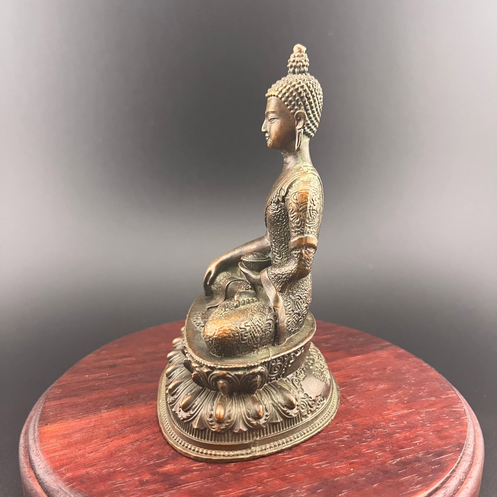 A SMALL BRONZE SHAKYAMUNI BUDDHA - 4