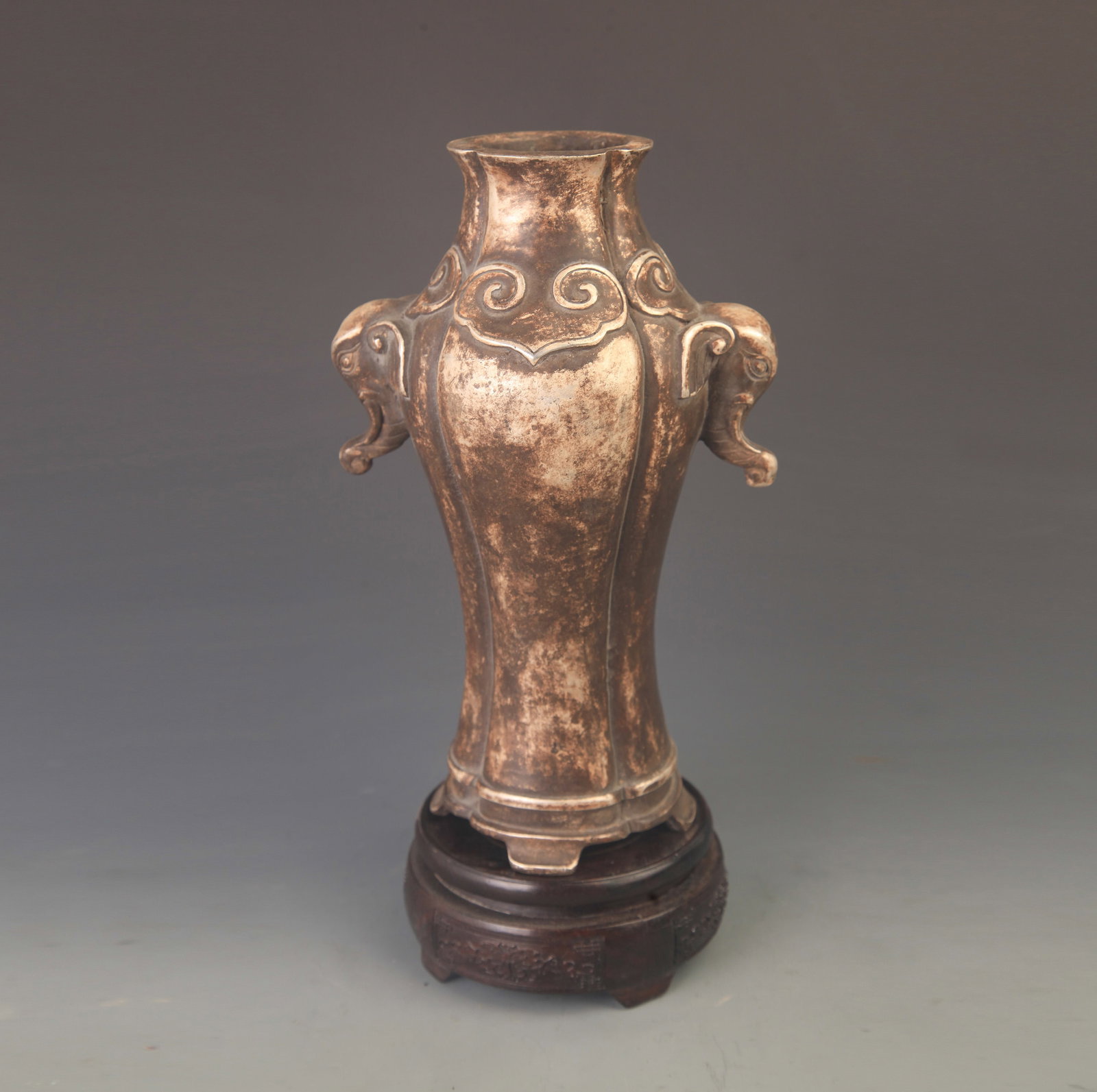 A SILVER-MOUNTED RUYI-FORM VASE WITH ELEPHANT-HEAD HANDLES (1 of 5)