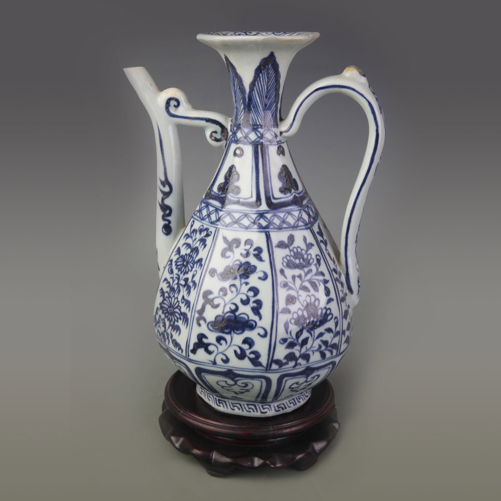 BLUE AND WHITE HEXAGONAL PORCELAIN VASE WITH FLORAL MOTIFS: Qing Dynasty Qian Long Period; Width: 5.4 inch; High: 14.4 inch; Woodbase for picture and display only