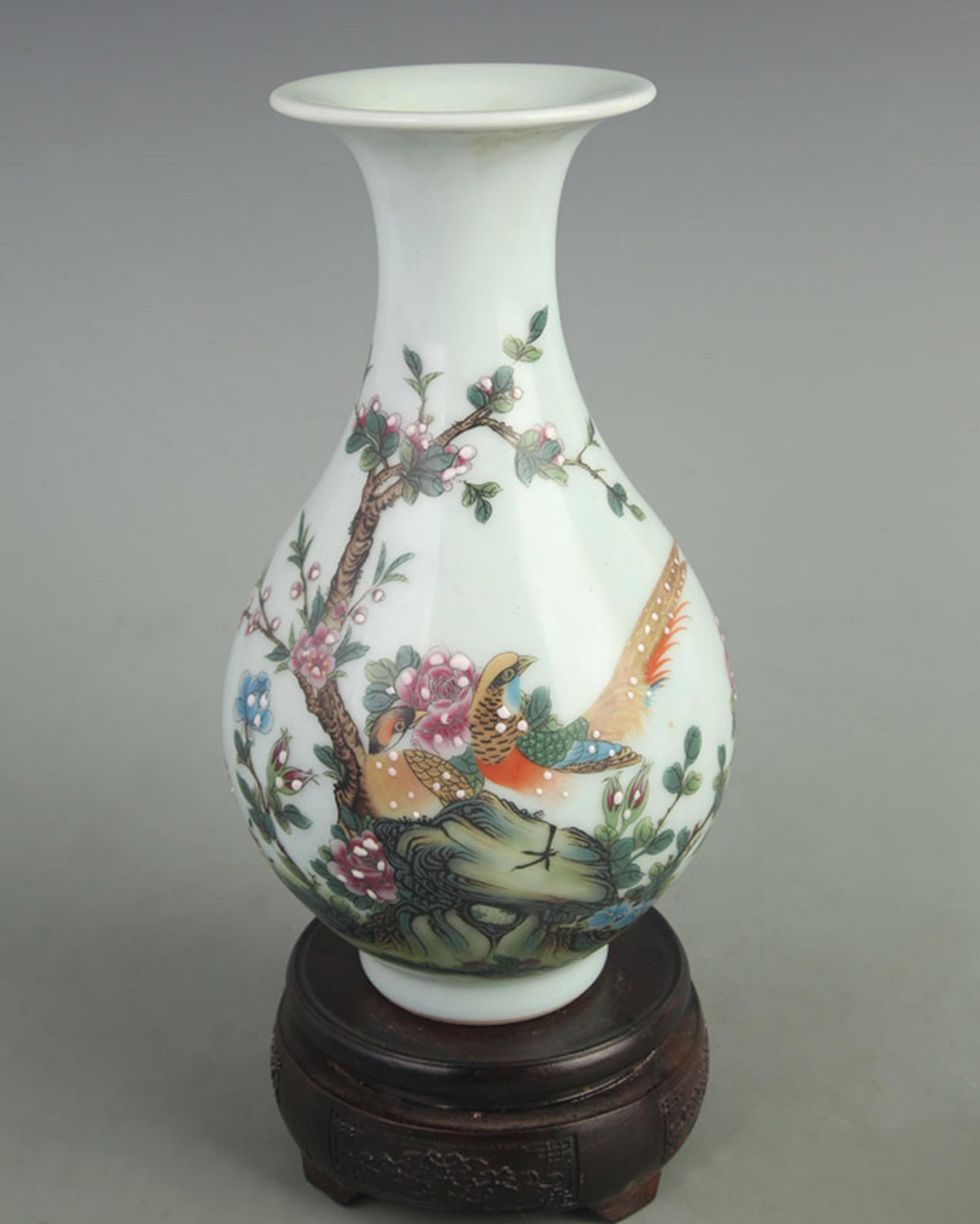 A FAMILLE-ROSE ENAMEL FLORAL YUHUCHUN VASE: Qing Dynasty Qian Long Period; High: 9.10 inch; Width: 4.60 inch; Woodbase for picture and display only
