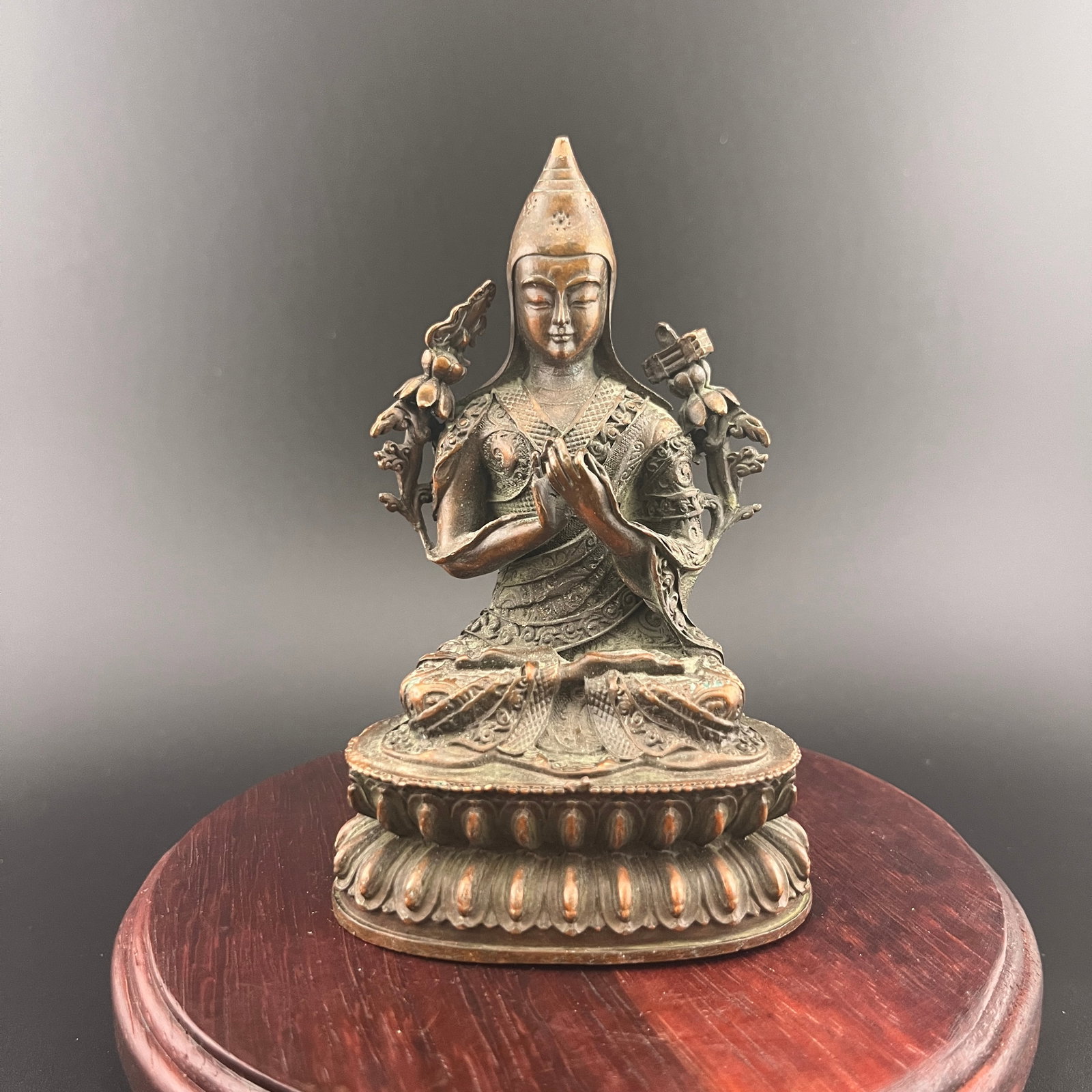 A SMALL BRONZE FIGURE BRONZE TSONGKHAPA (TIBETAN BUDDHIST MASTER) (1 of 5)