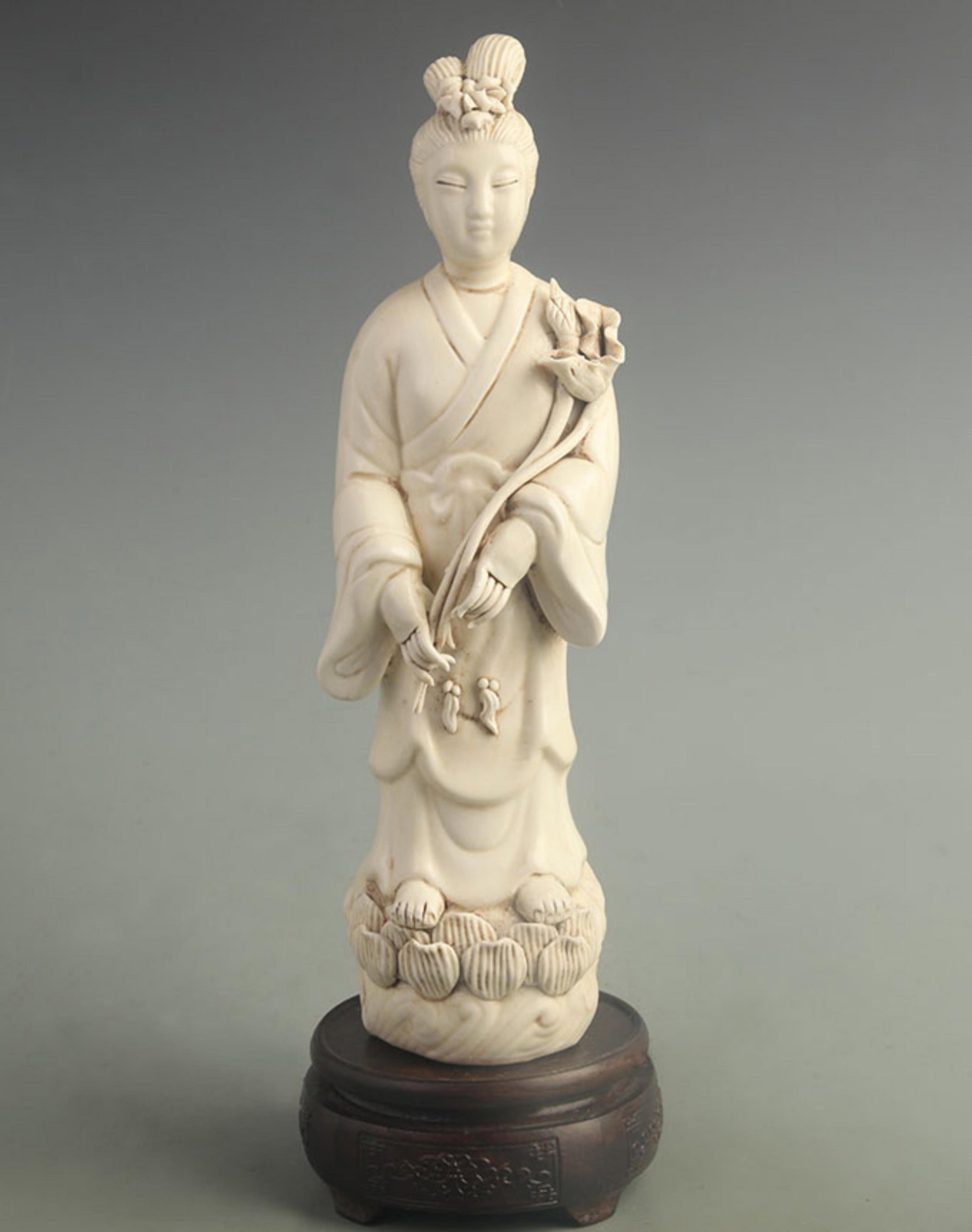 A DEHUA PORCELAIN FIGURE OF HE XIANGU (EIGHT IMMORTALS): Qing Dynasty; High: 12.5 inch;Width: 3.50 inch; Woodbase for picture and display only
