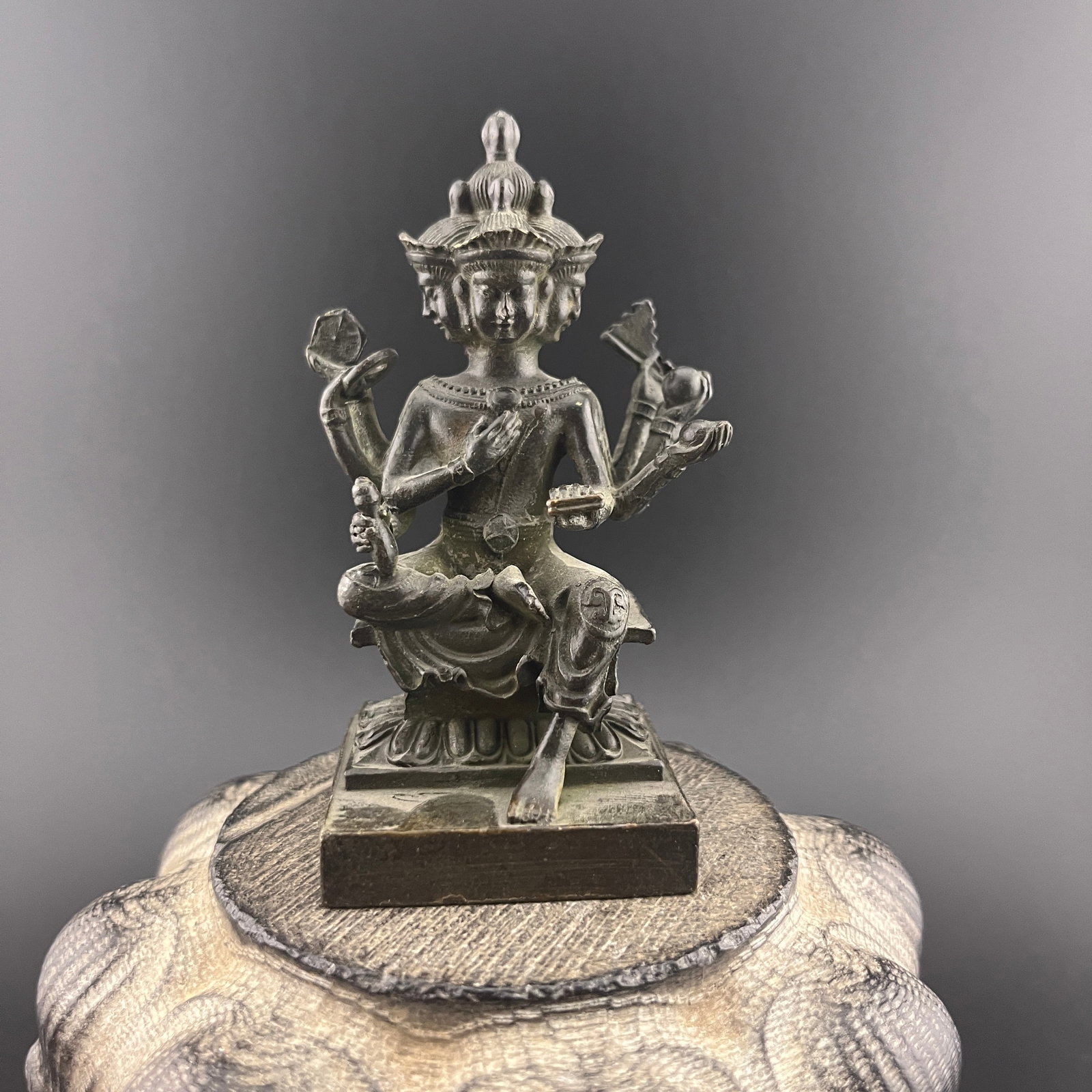 A SMALL BRONZE FOUR FACE PHRA PHROM STATUE: 20th Century; Width:2.1 inch; Heigh: 3.5 inch; Woodbase for picture and display only