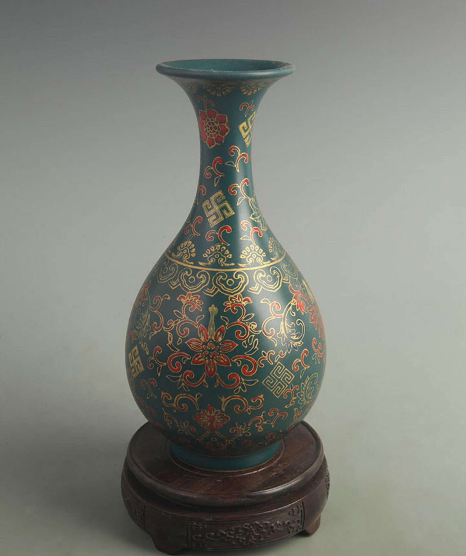 DARK GREEN GLAZED YUHUCHUN PORCELAIN VASE WITH FLORAL PATTERN: Qing Dynasty Yong Zheng Period; High: 10.0 inch Width: 5.00 inch; Woodbase for picture and display only