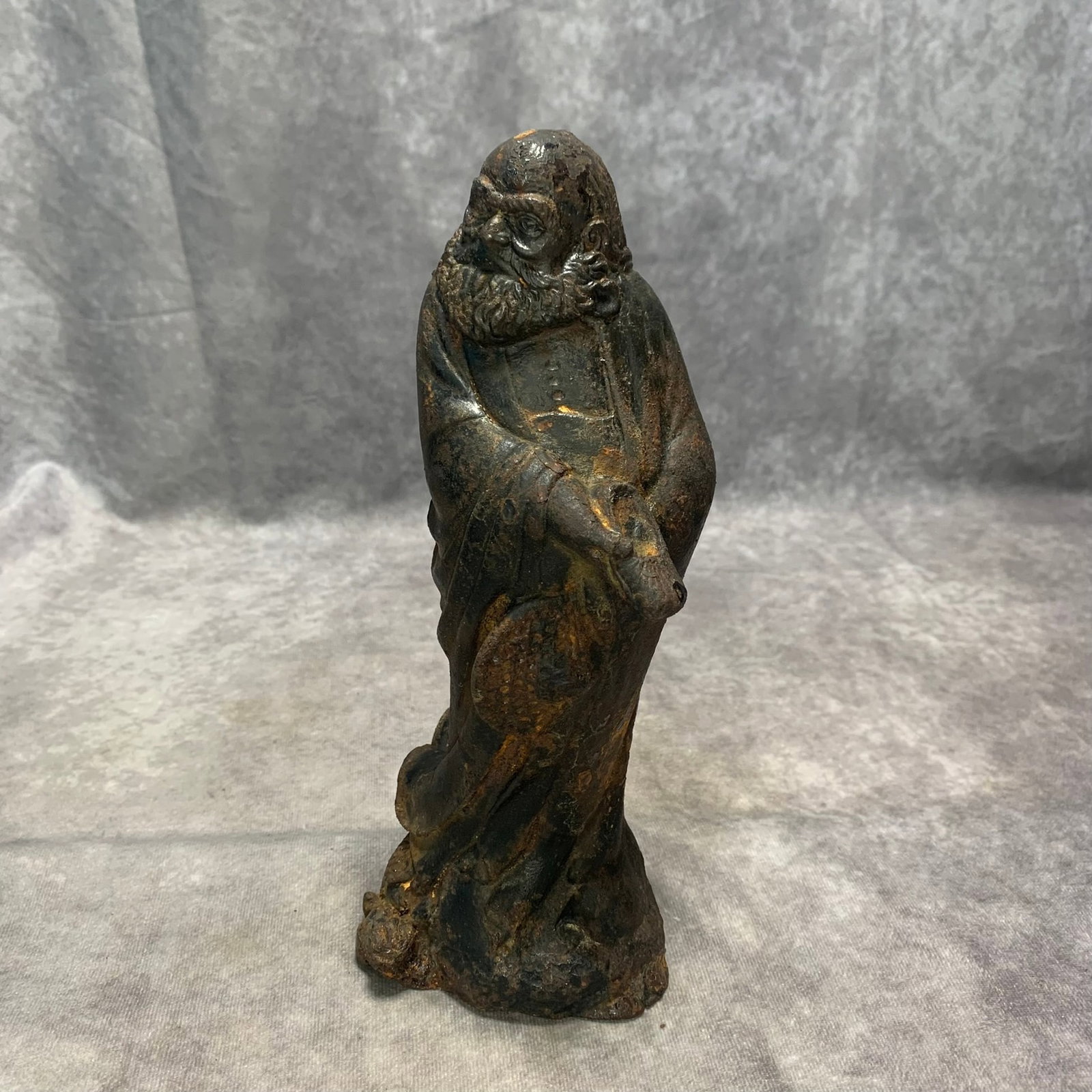 CAST IRON DARUMA STANDING STATUE: Republic Period; Long: 4.1 inch; Width: 3.5 inch; High: 10 inch; Woodbase for picture and display only