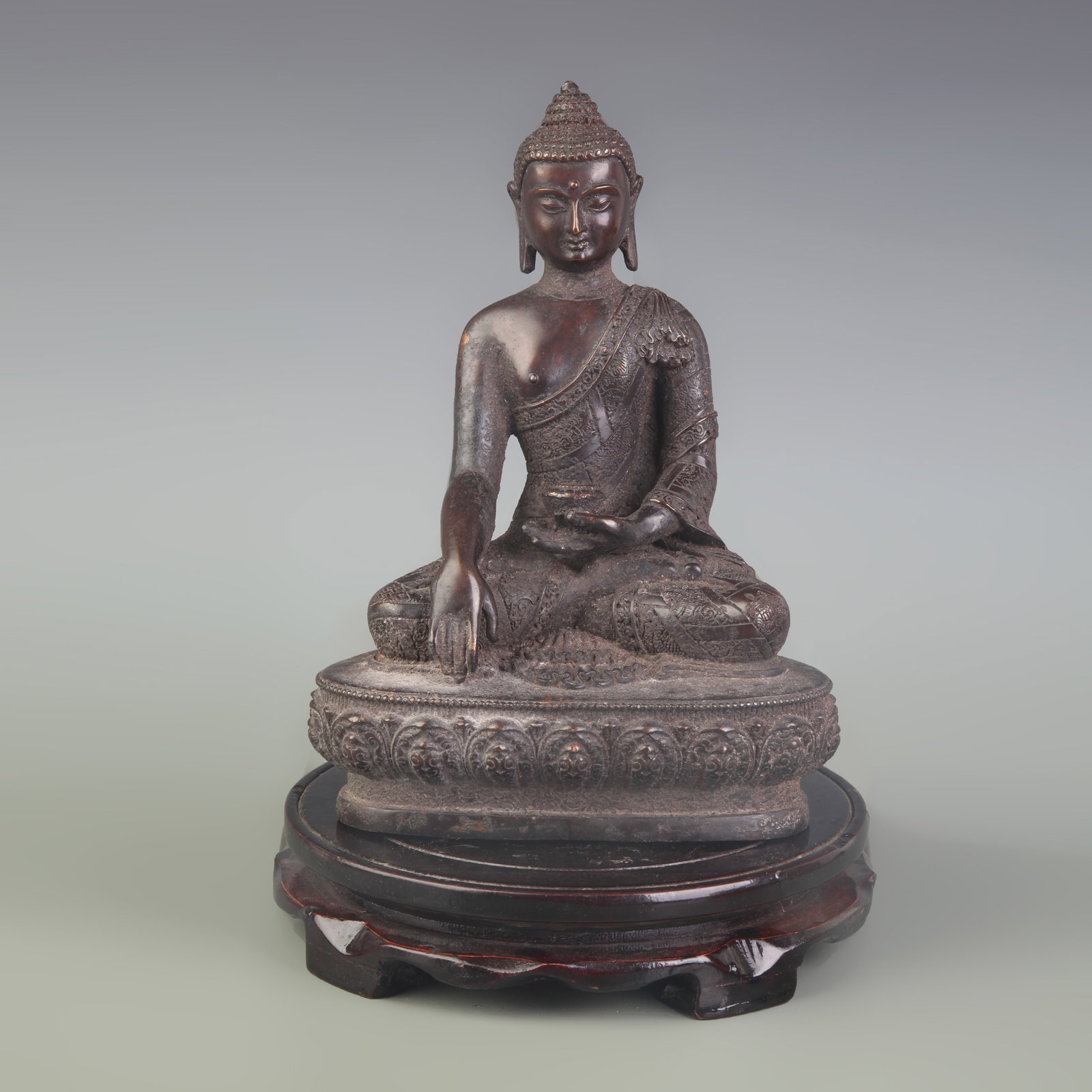GILT BRONZE SHAKYAMUNI BUDDHA STATUE: Qing Dynasty; Width: 5.6 inch; High: 8.1 inch ; Woodbase for picture and display only