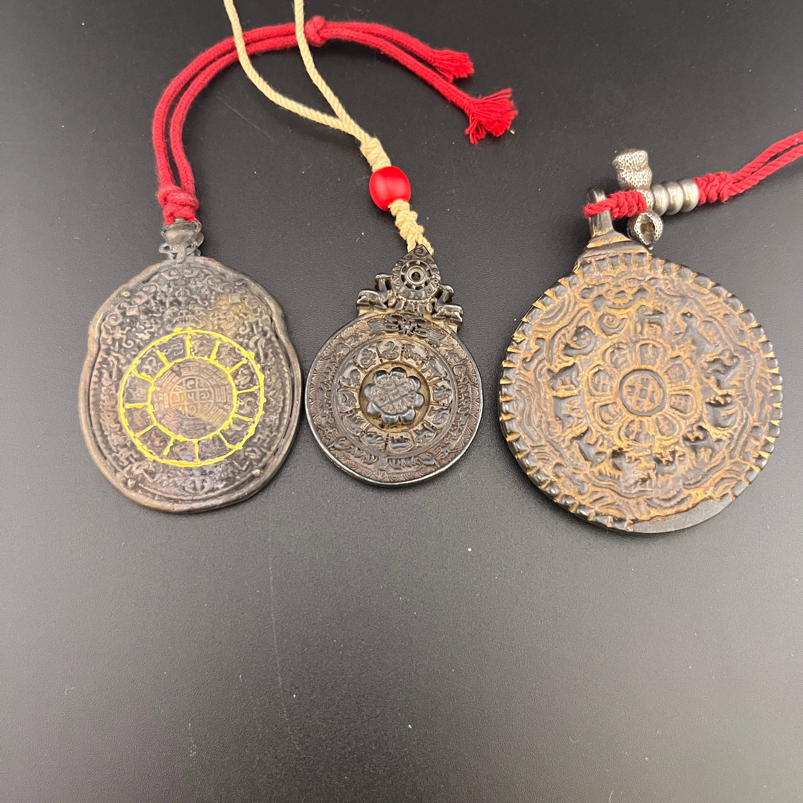 GROUP OF THREE TIBETAN BUDDHIST JIU GONG BAGUA AMULETS (1 of 5)