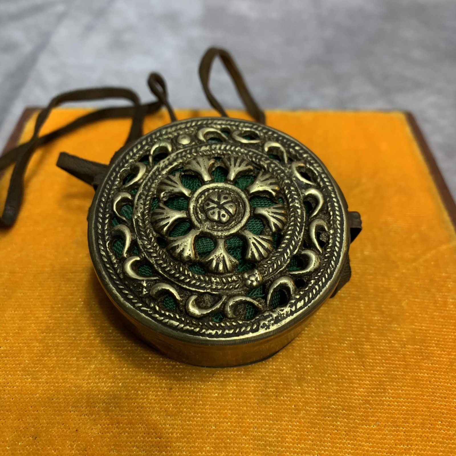 A FINE TIBETAN BUDDHISM BRONZE MADE PENDANT: Modern, High: 1.0 inch; Diameter: 2.3 inch ; Woodbase for picture and display only