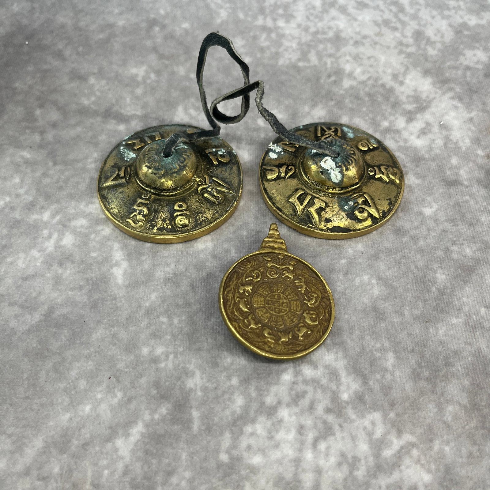 A GROUP OF TIBETAN BUDDHIST RITUAL IMPLEMENTS: Qing Dynasty; Long: 2.3 inch; Width: 1.8 inch; High: 0.3 inch; High: 0.71 inch; Diameter: 2.57 inch; Woodbase for picture and display only